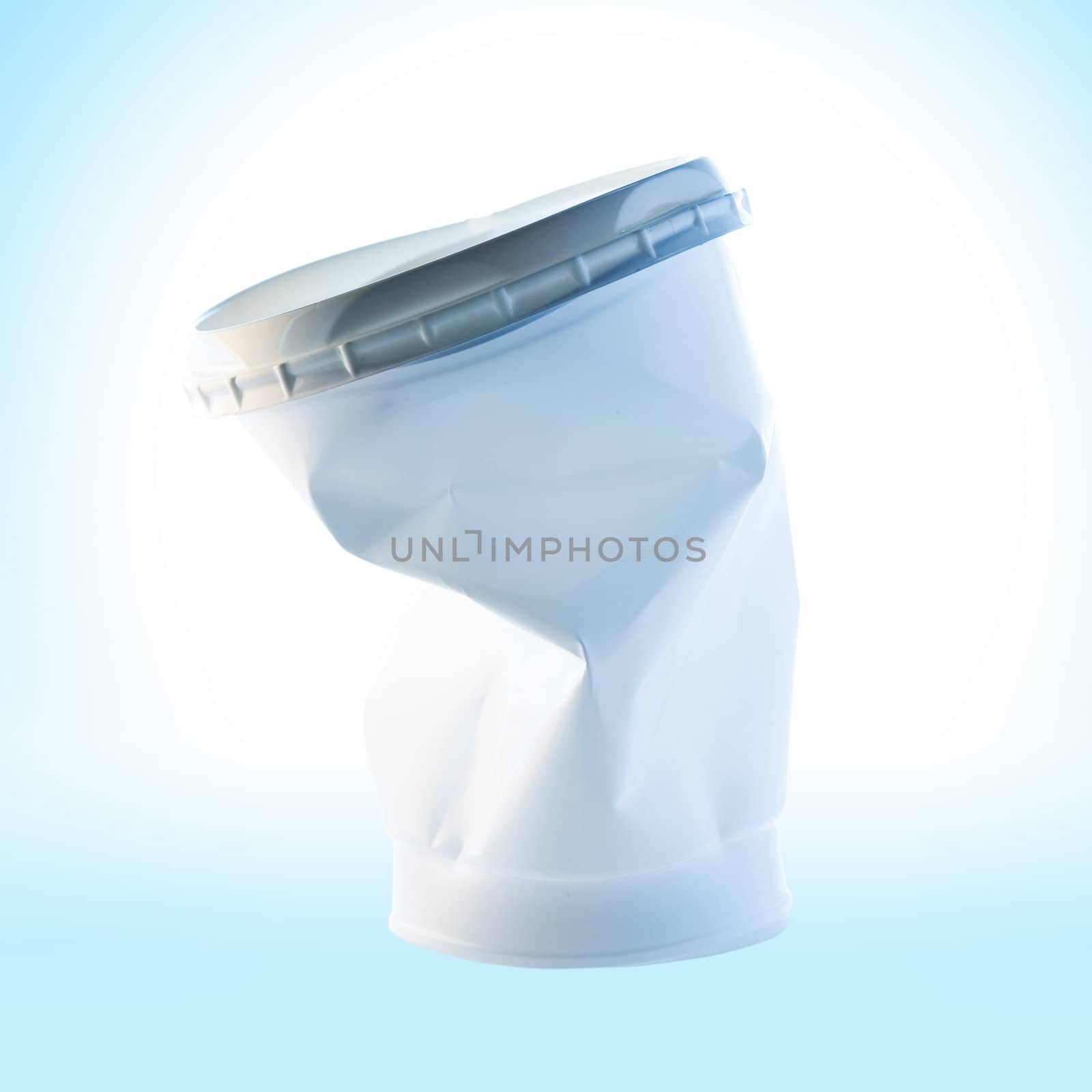 Stock photo: an image of a big white plastic cup closeup