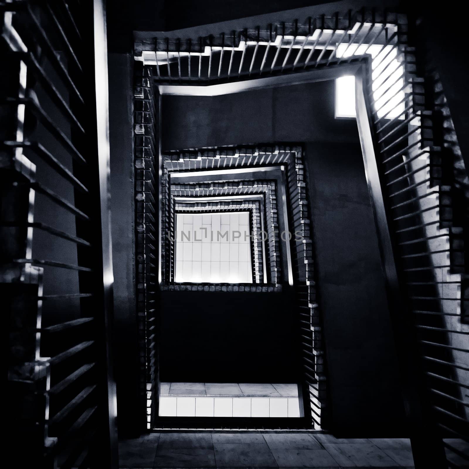 toned shot of abstract winding staircase