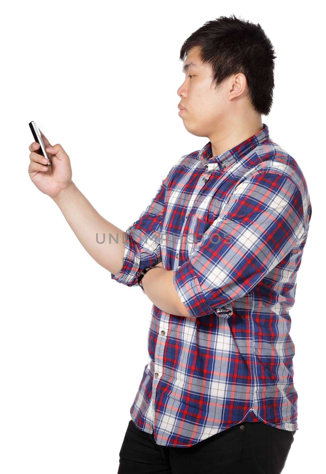 man writing message on mobile phone