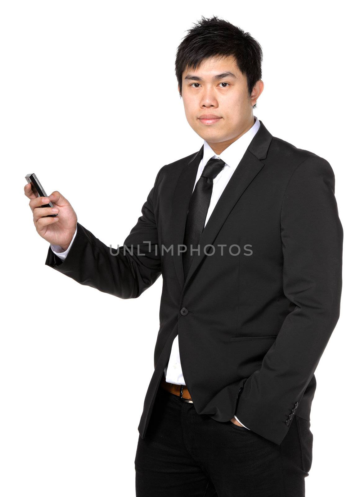 young business man with mobile phone by leungchopan