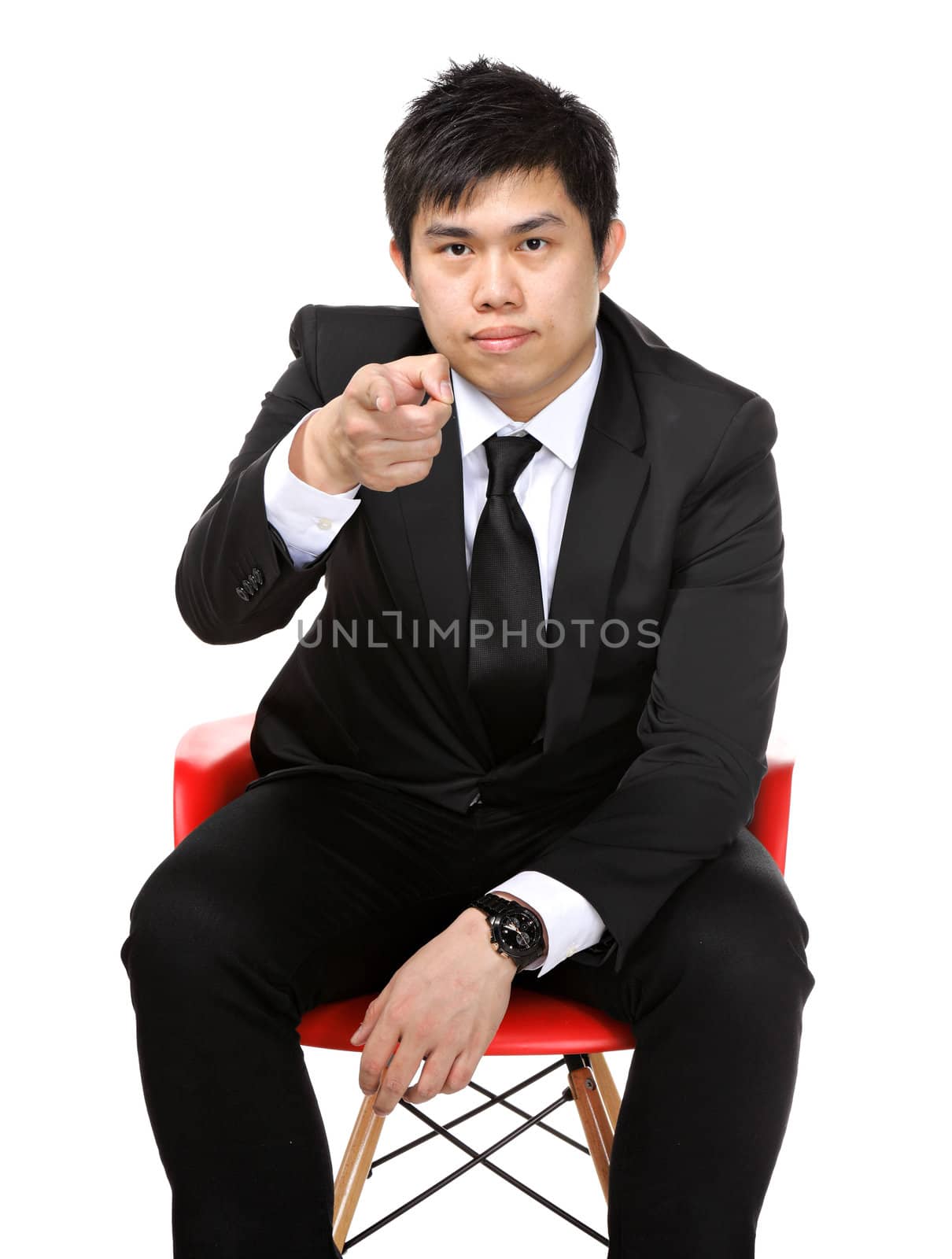 business man sit and point to you