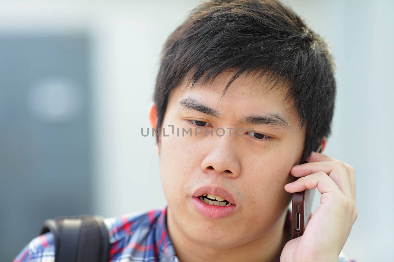 man on phone call by leungchopan