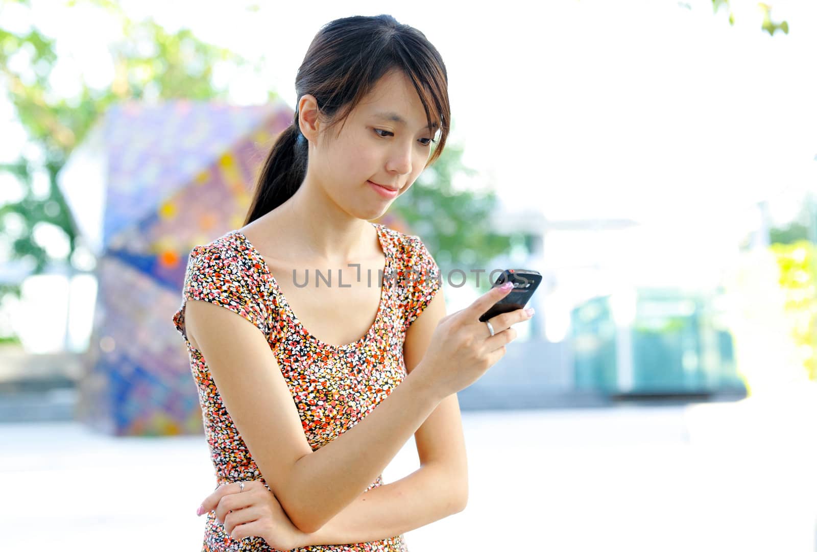 woman sms on mobile phone