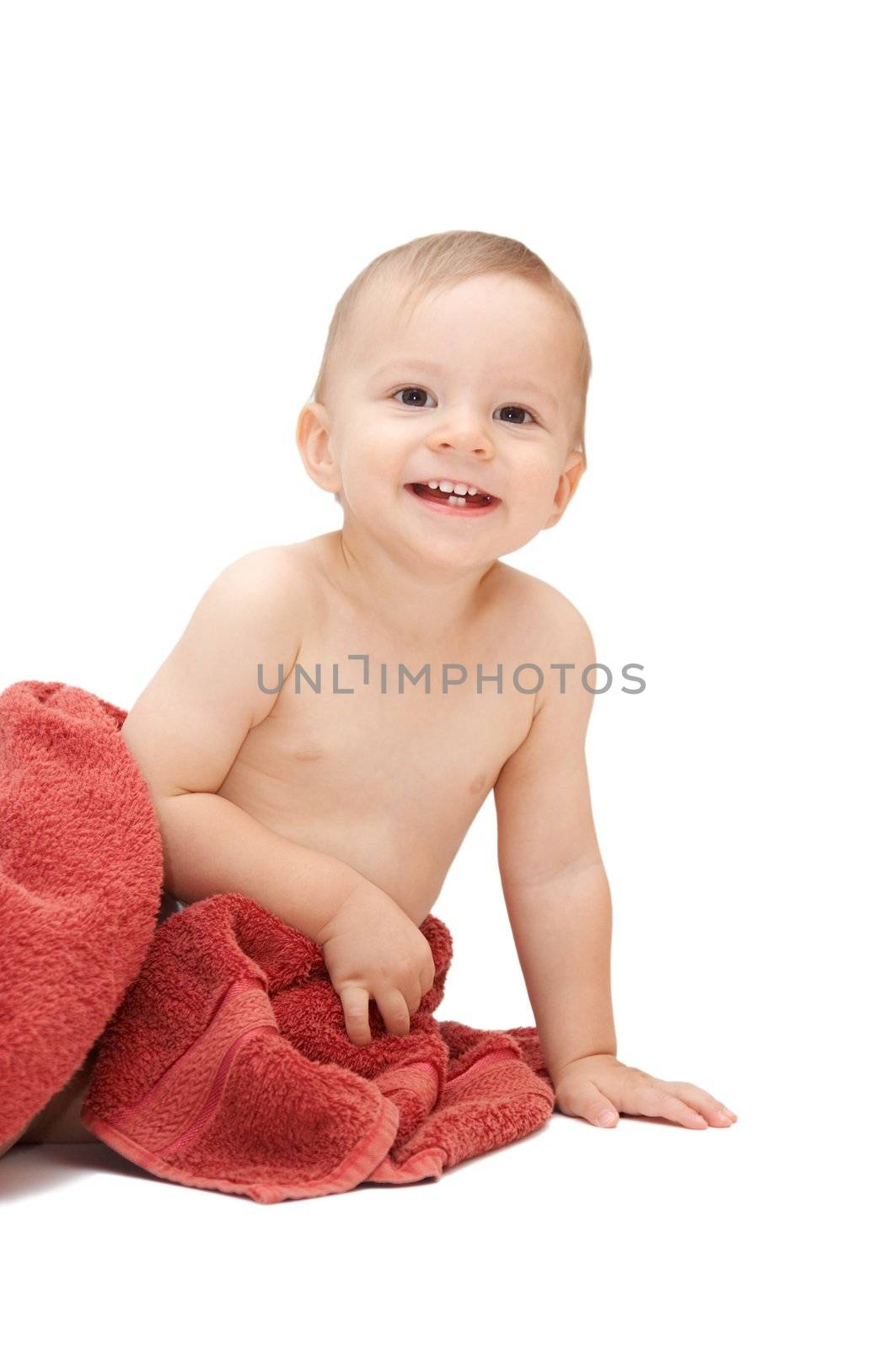 smiling baby in towel