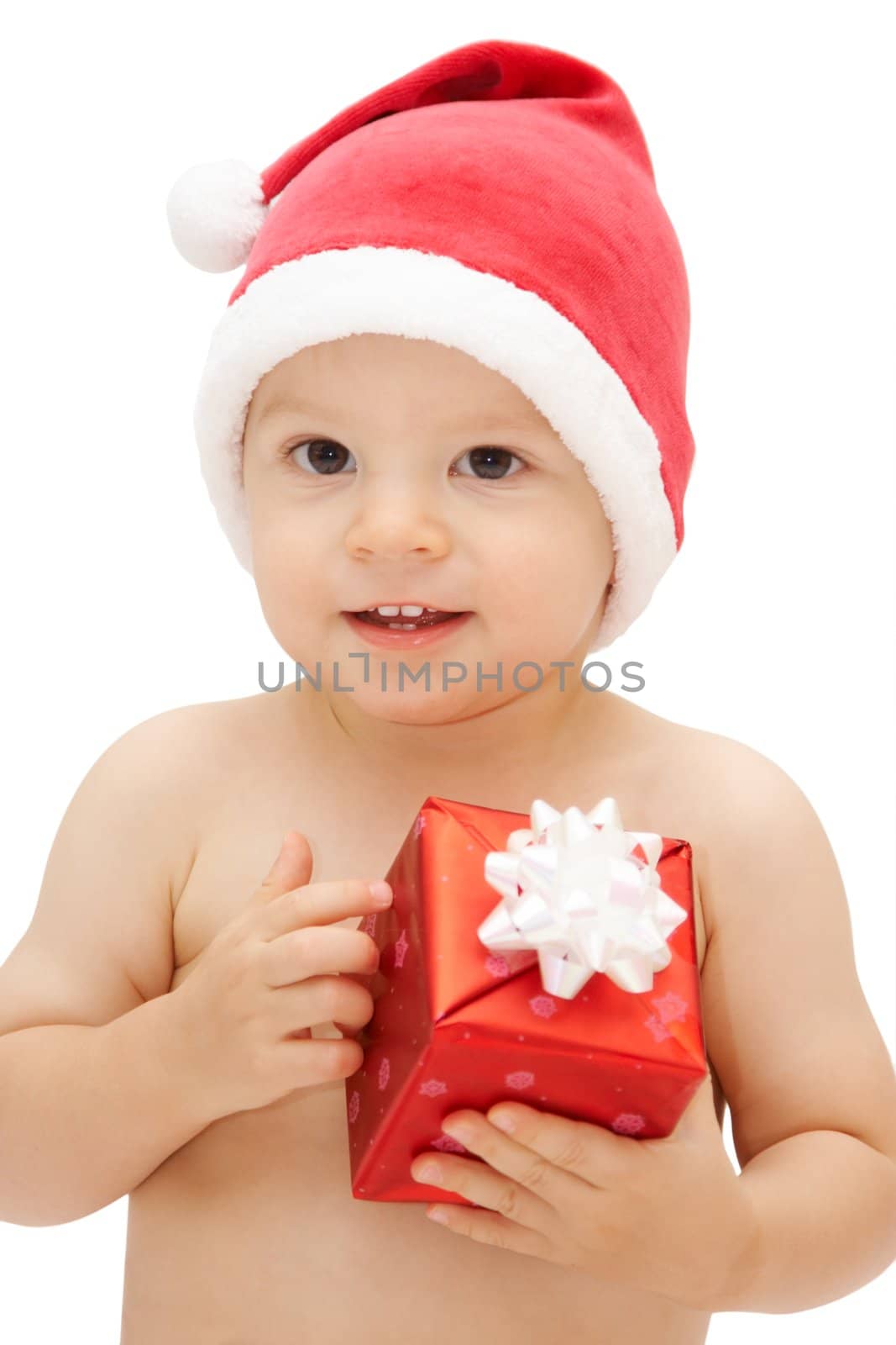 baby in santa claus cap with gift