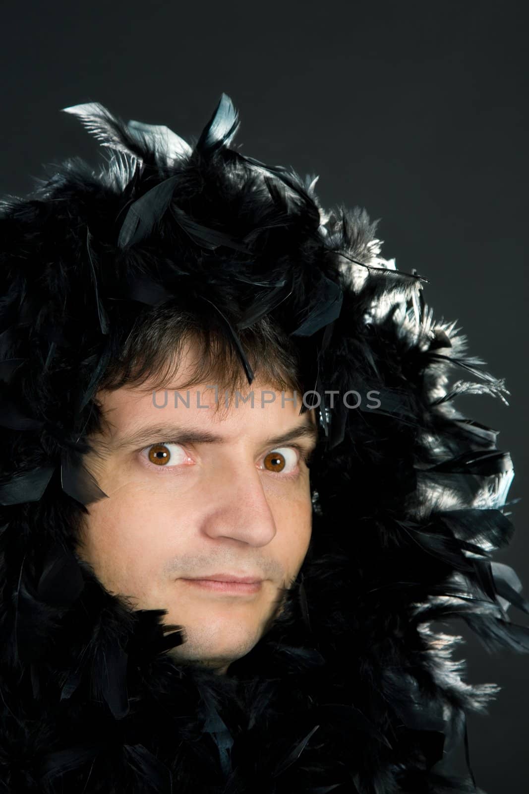 man in black feather boa