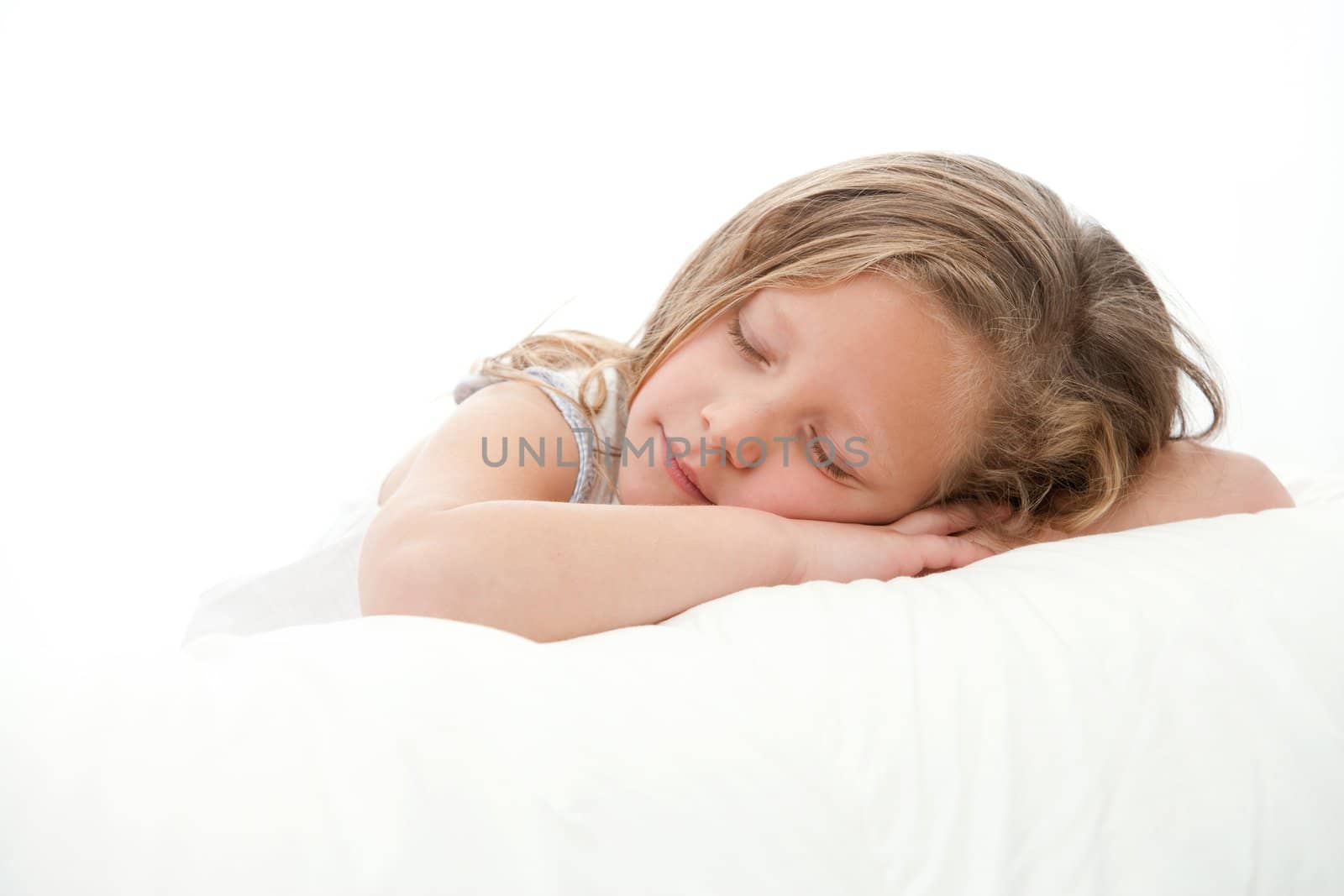 High key Close up portrait  of cute little girl sleeping. Isolated on white background.