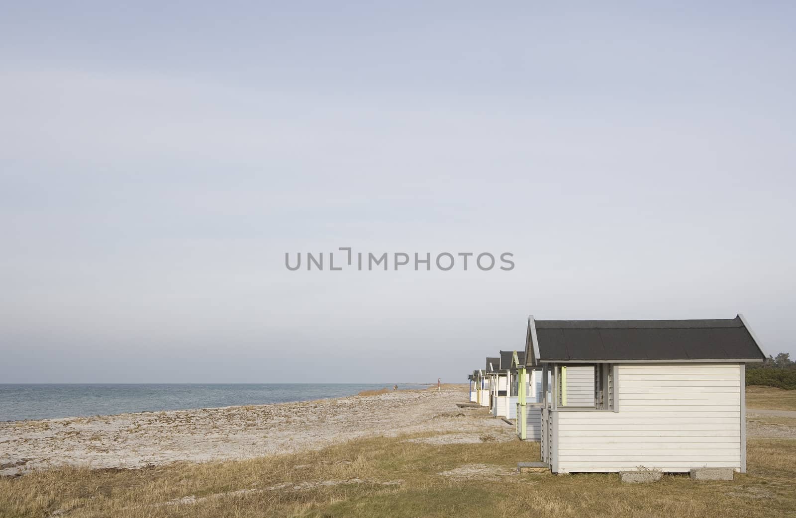 Beach Huts in a row close to water