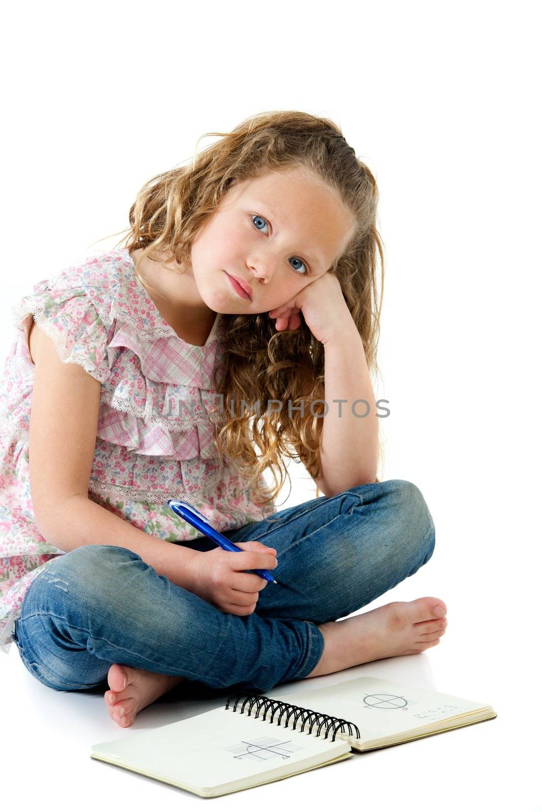 Portrait of bored looking little blond girl with homework. Isolated on white.