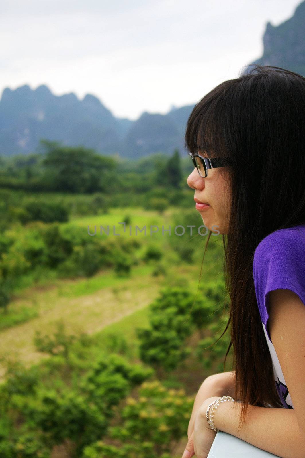 Asian woman thinking outdoor by kawing921