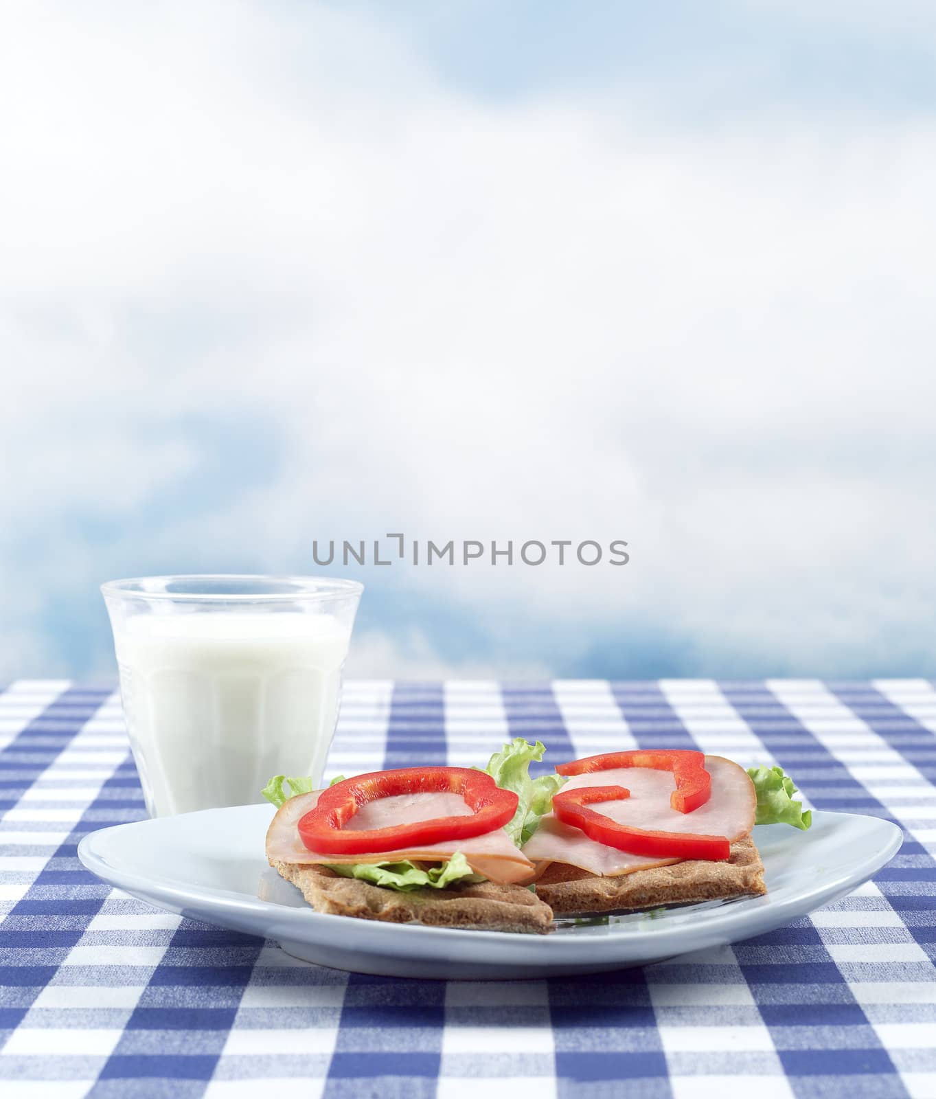 Breakfast with bread and milk on a table