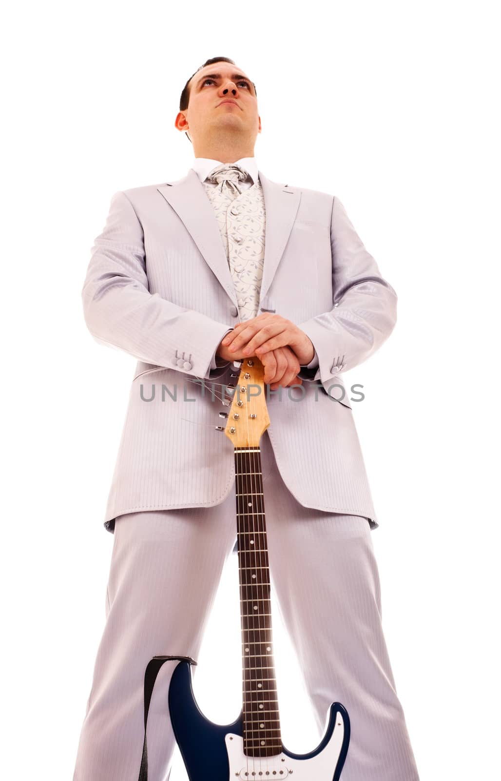 man standing with electro guitar on white background