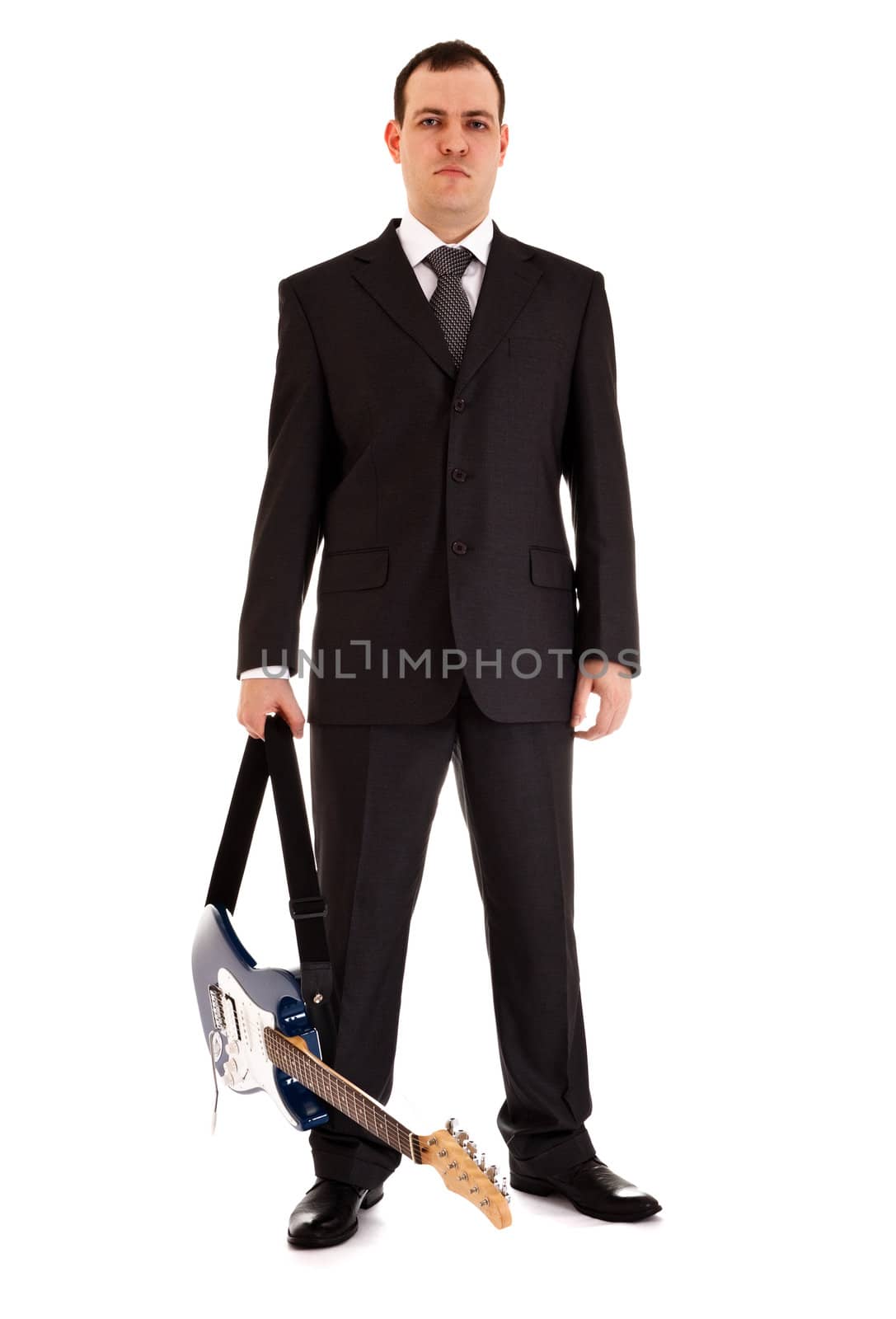 man in black suit stand with electric guitar, isolated on white background