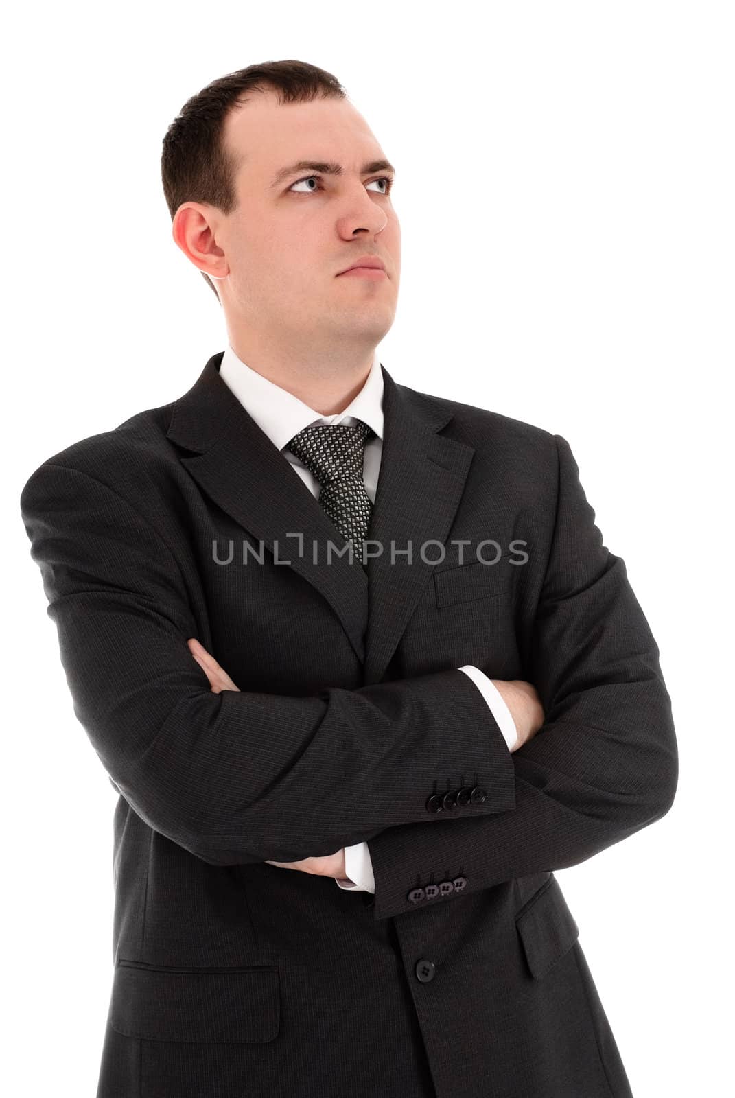 serious businessman looks somewhere, white background