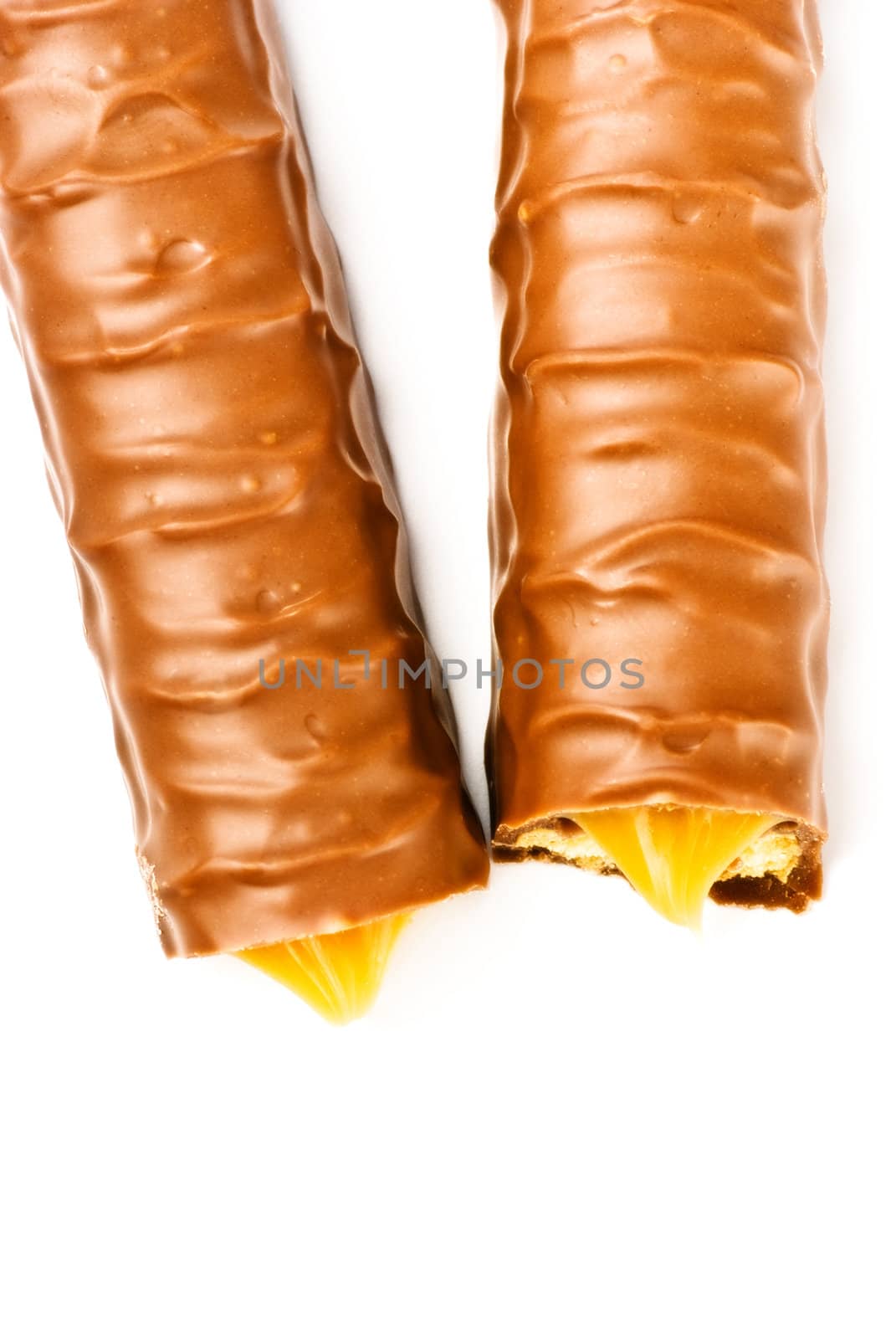 two chocolate sticks isolated on white, top view