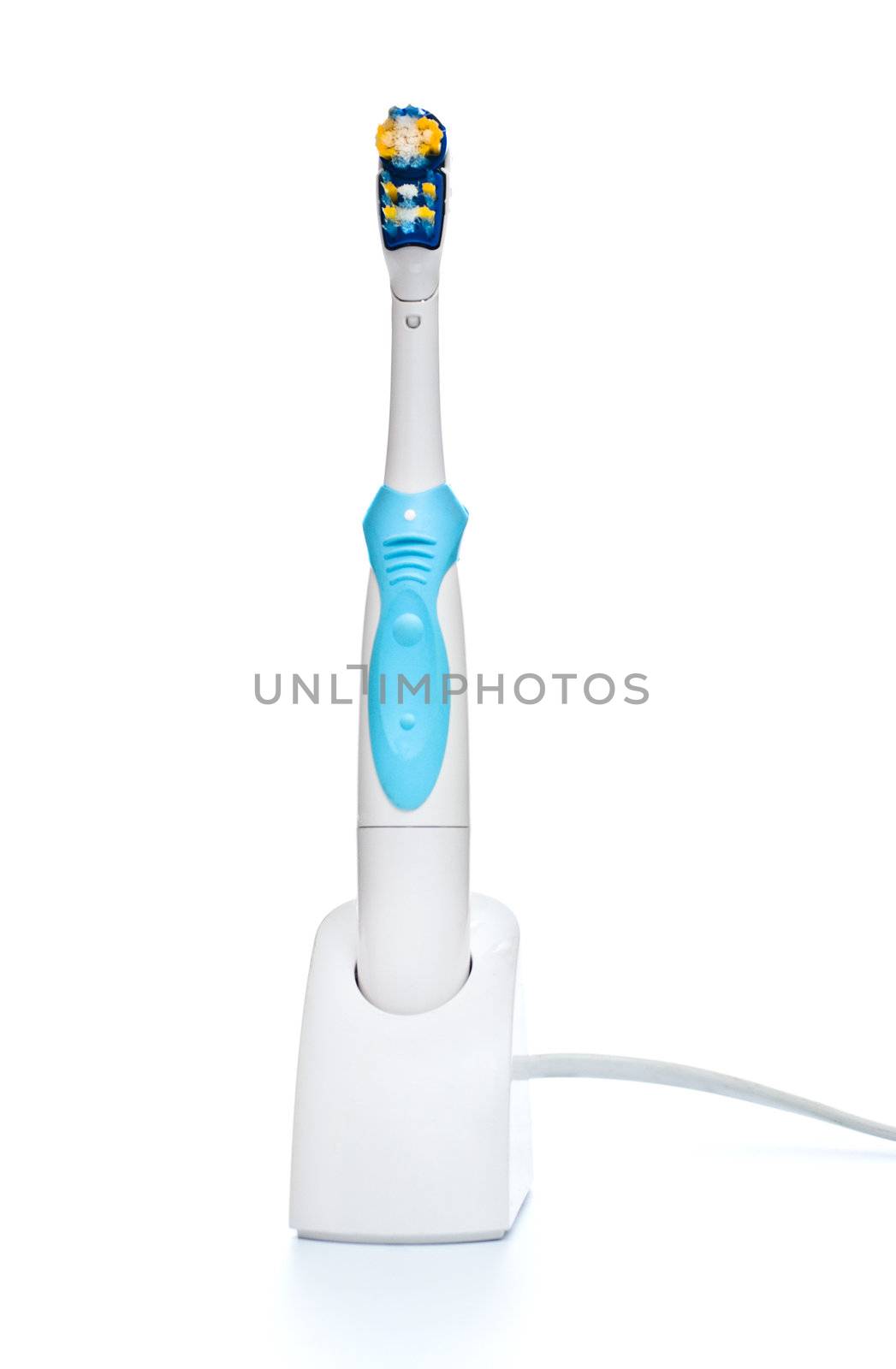 electric toothbrush on stand, front view