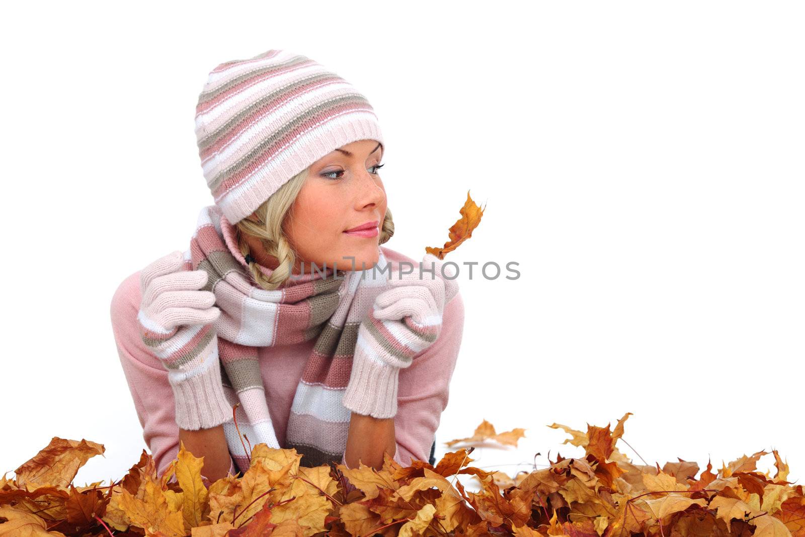  studio portrait of autumn woman in  yellow leaves