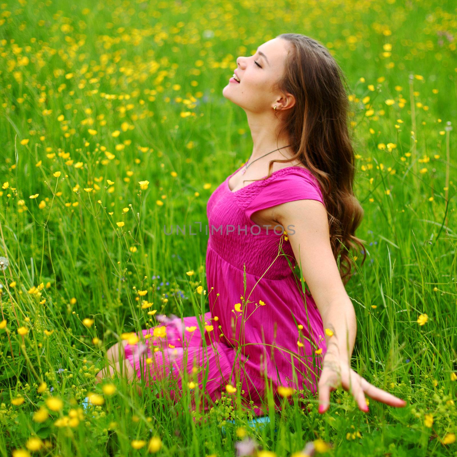 woman on flower field close portrait