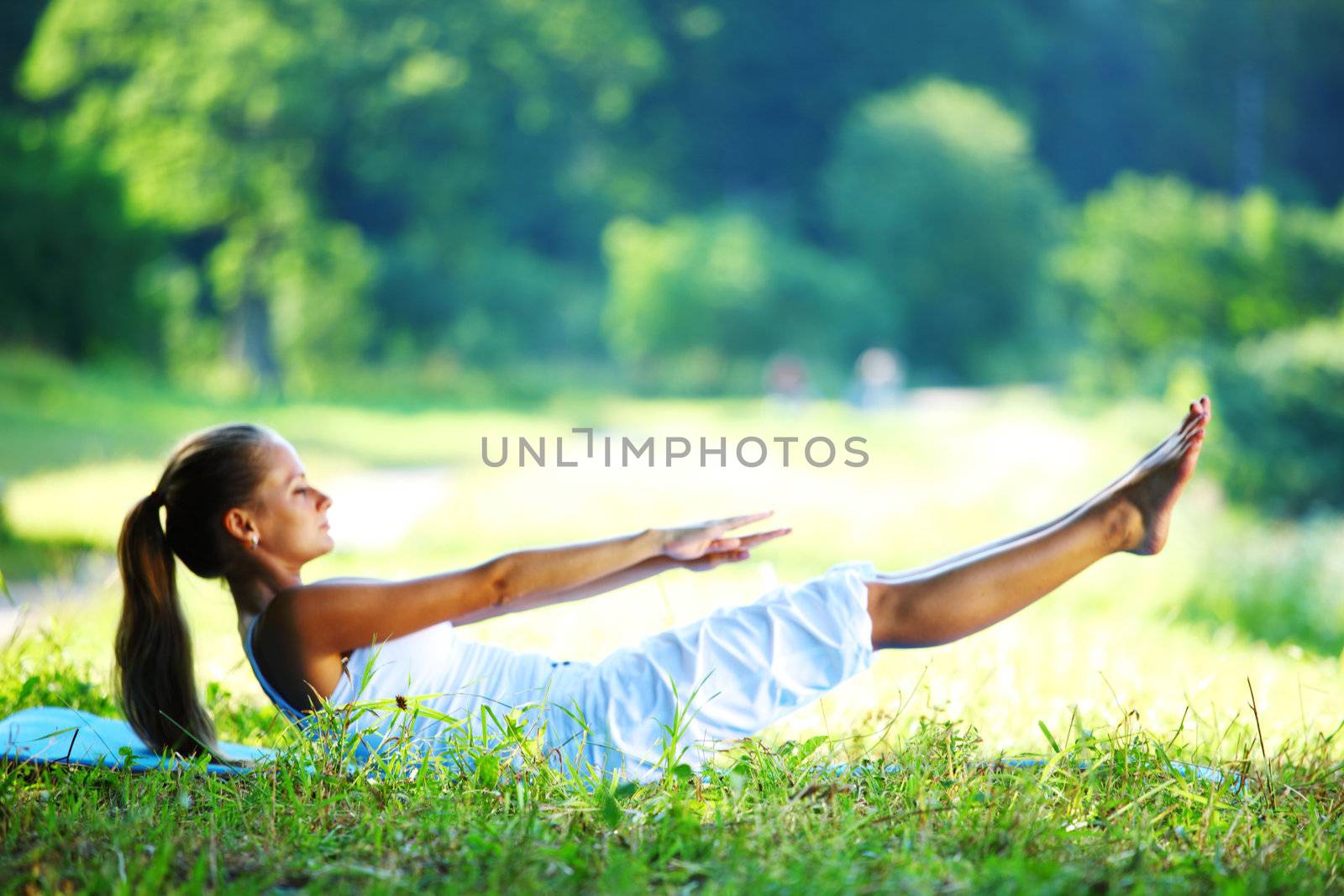  woman lay and training on ground 
