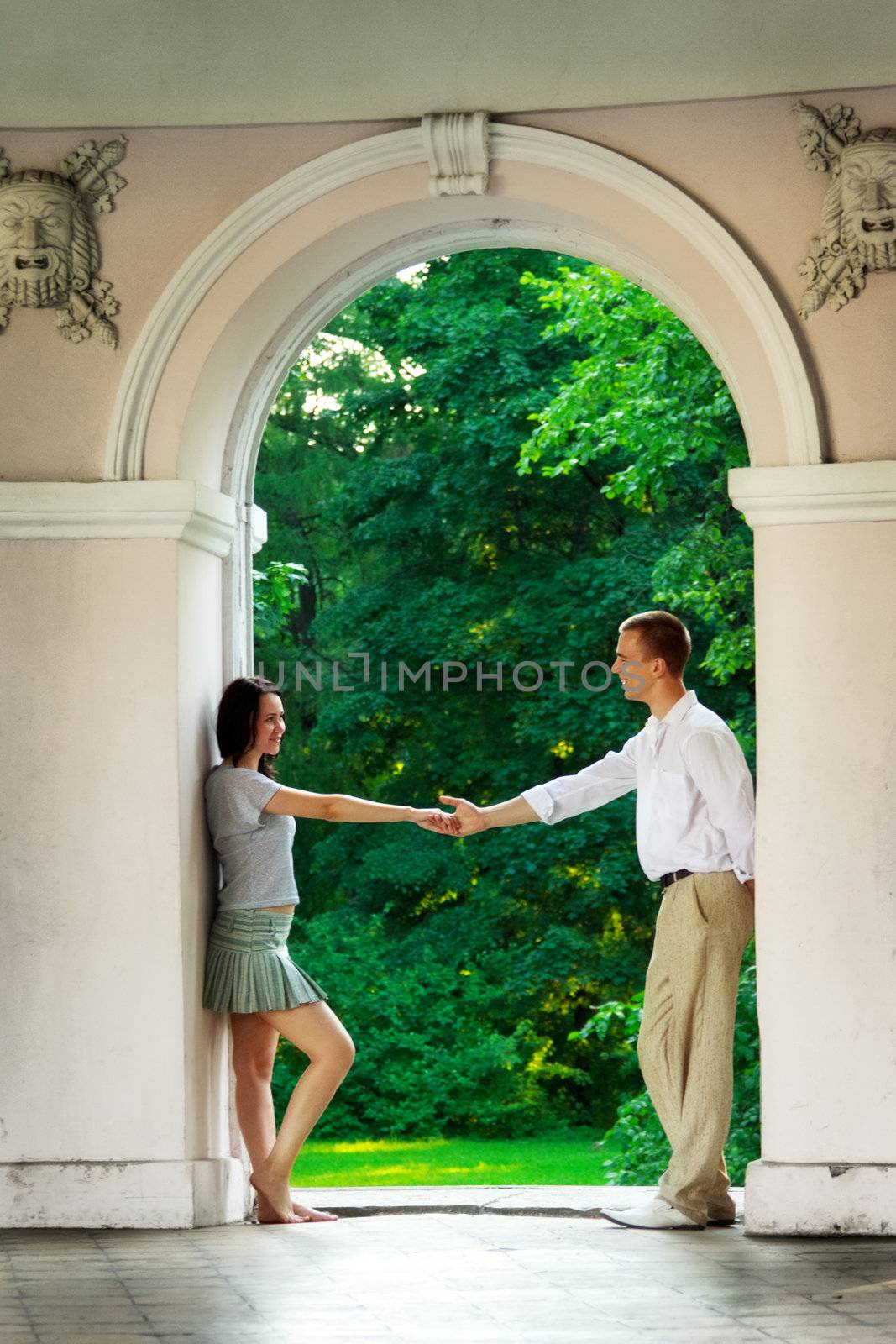 young couple ready to dance in old park theater
