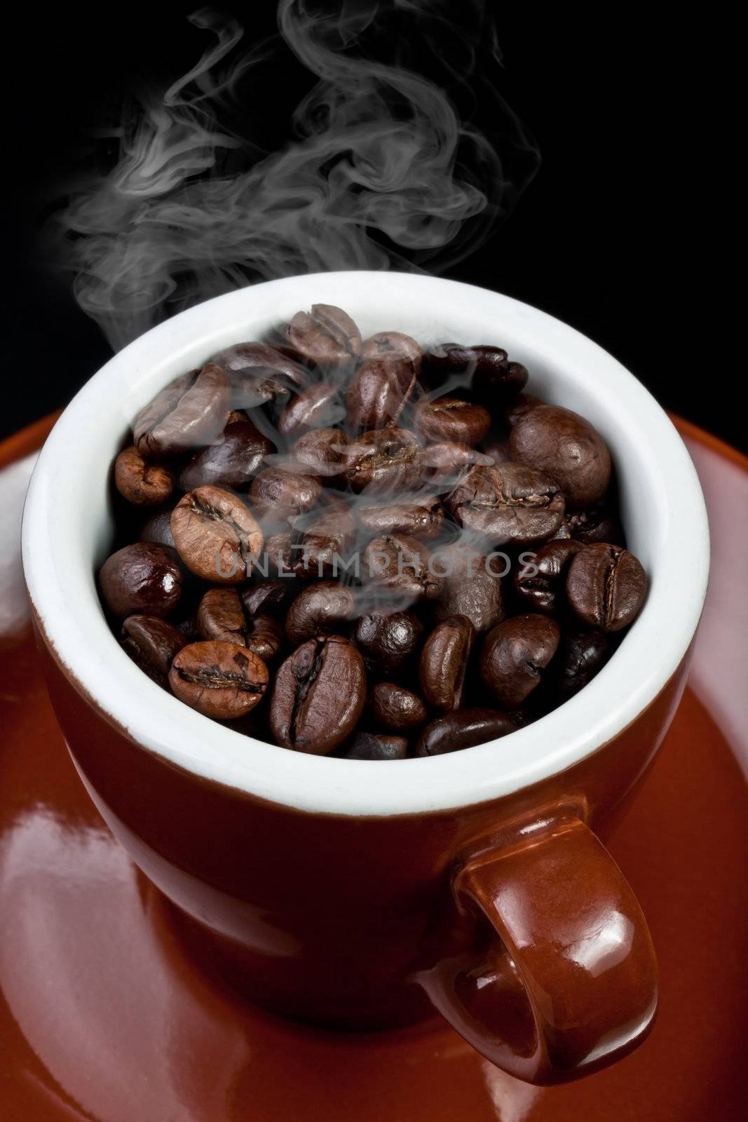 coffee beans on a brown cup