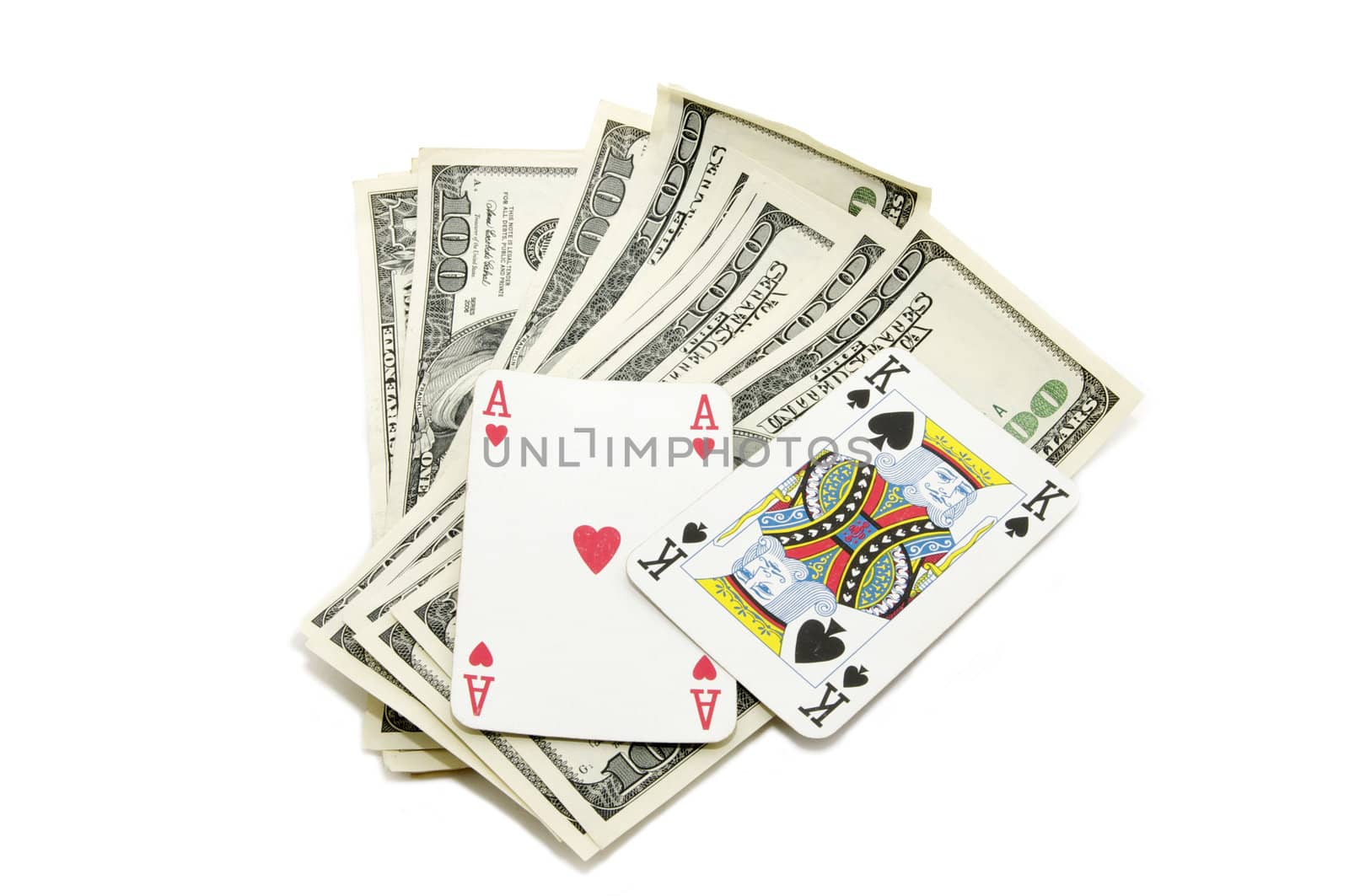 Dollars and playing cards on white composition