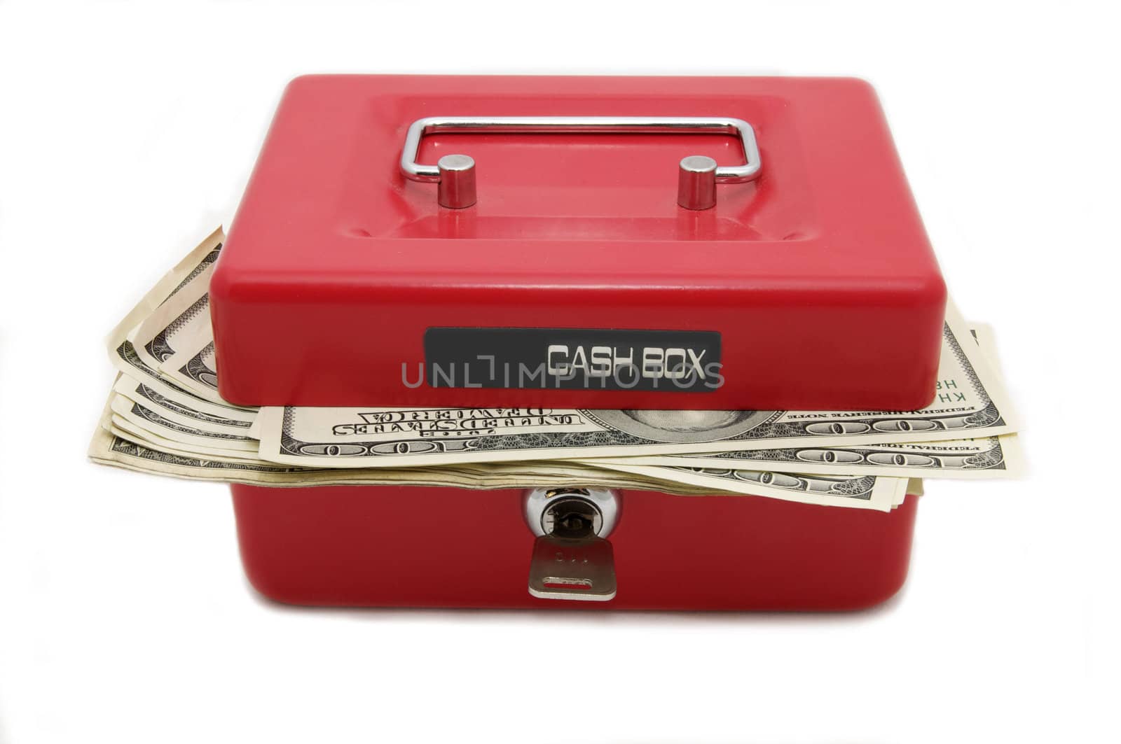 Dollars in Cash in a small safe on a white background