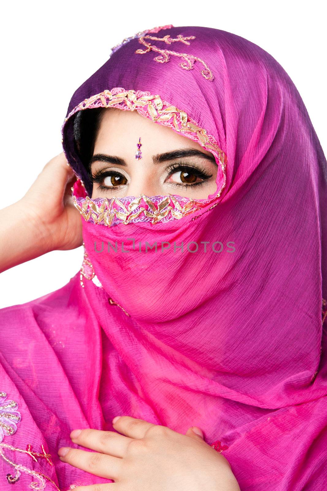 Beautiful Bengali Indian Hindu woman holding colorful headscarf veil in front of face, isolated