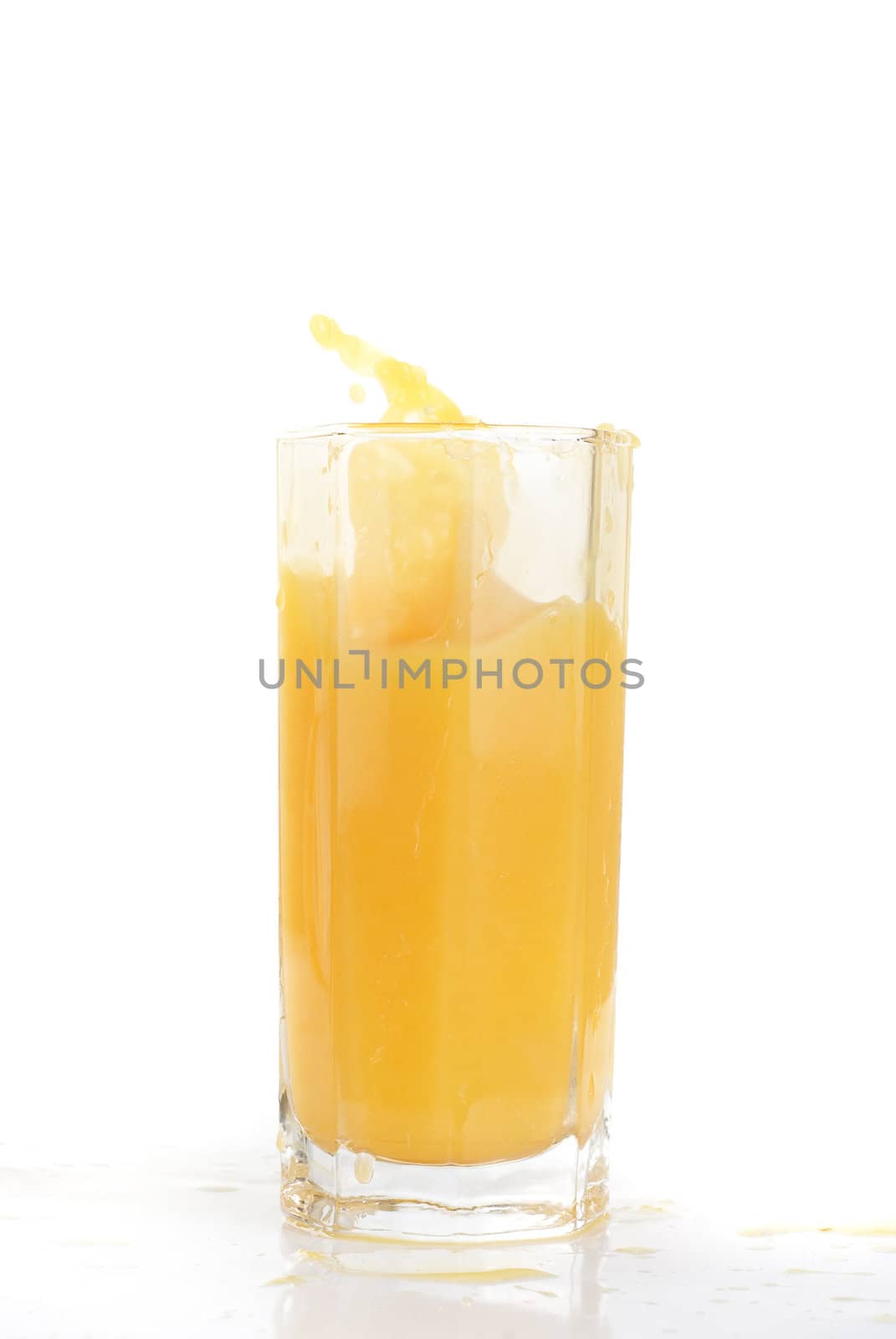 orange juice splash isolated on a white background
