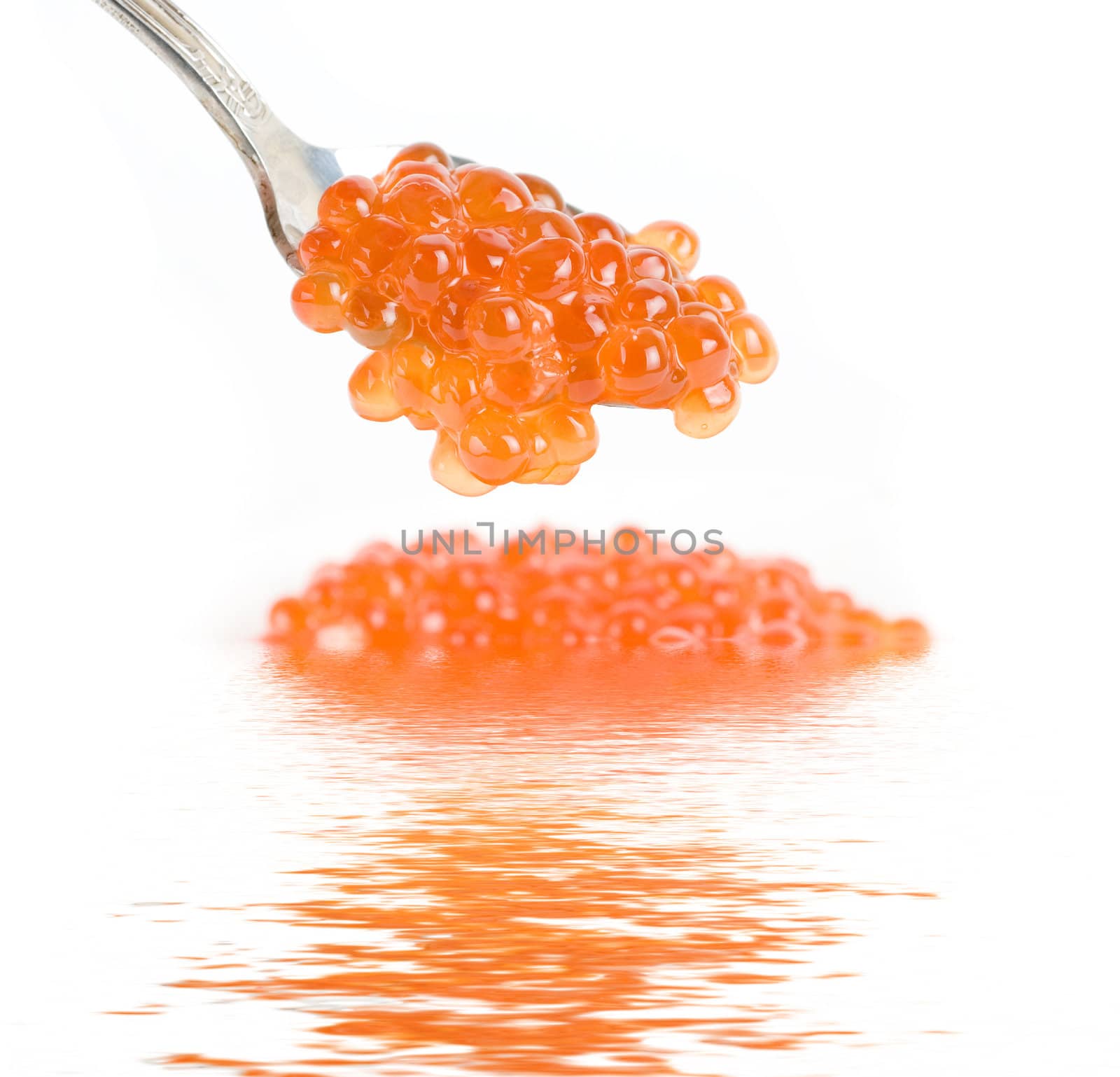 red caviar with spoon on a white background