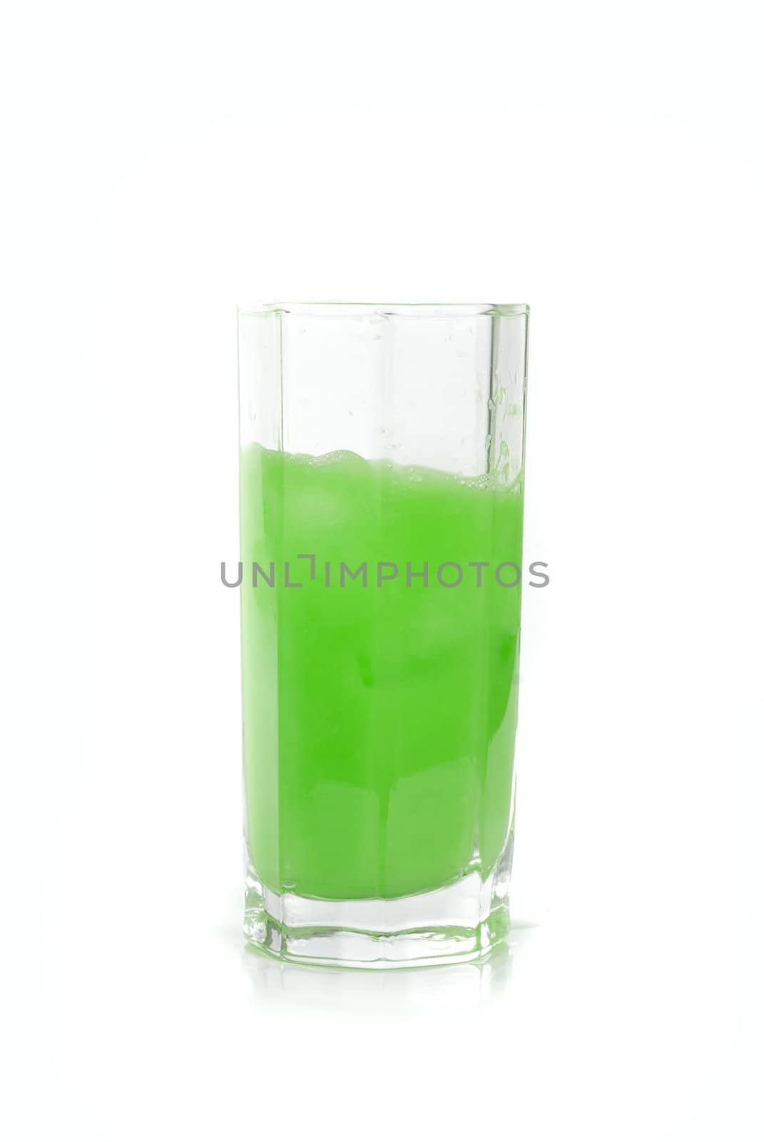 Fresh squeezed green lime juice isolated on a white background
