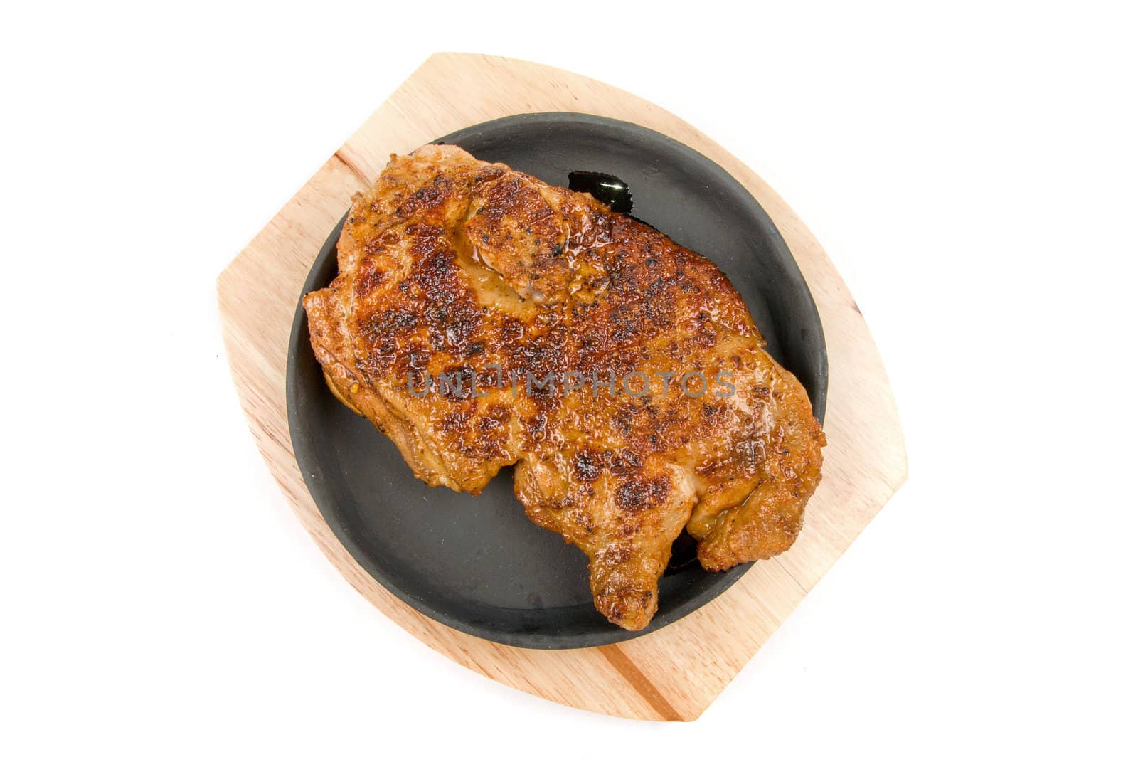 delicious grilled chicken on a pan isolated over white background