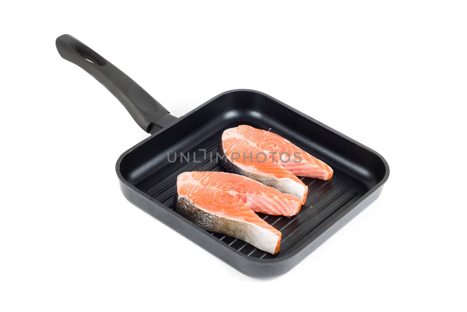 trout steak at grill pan on a white background