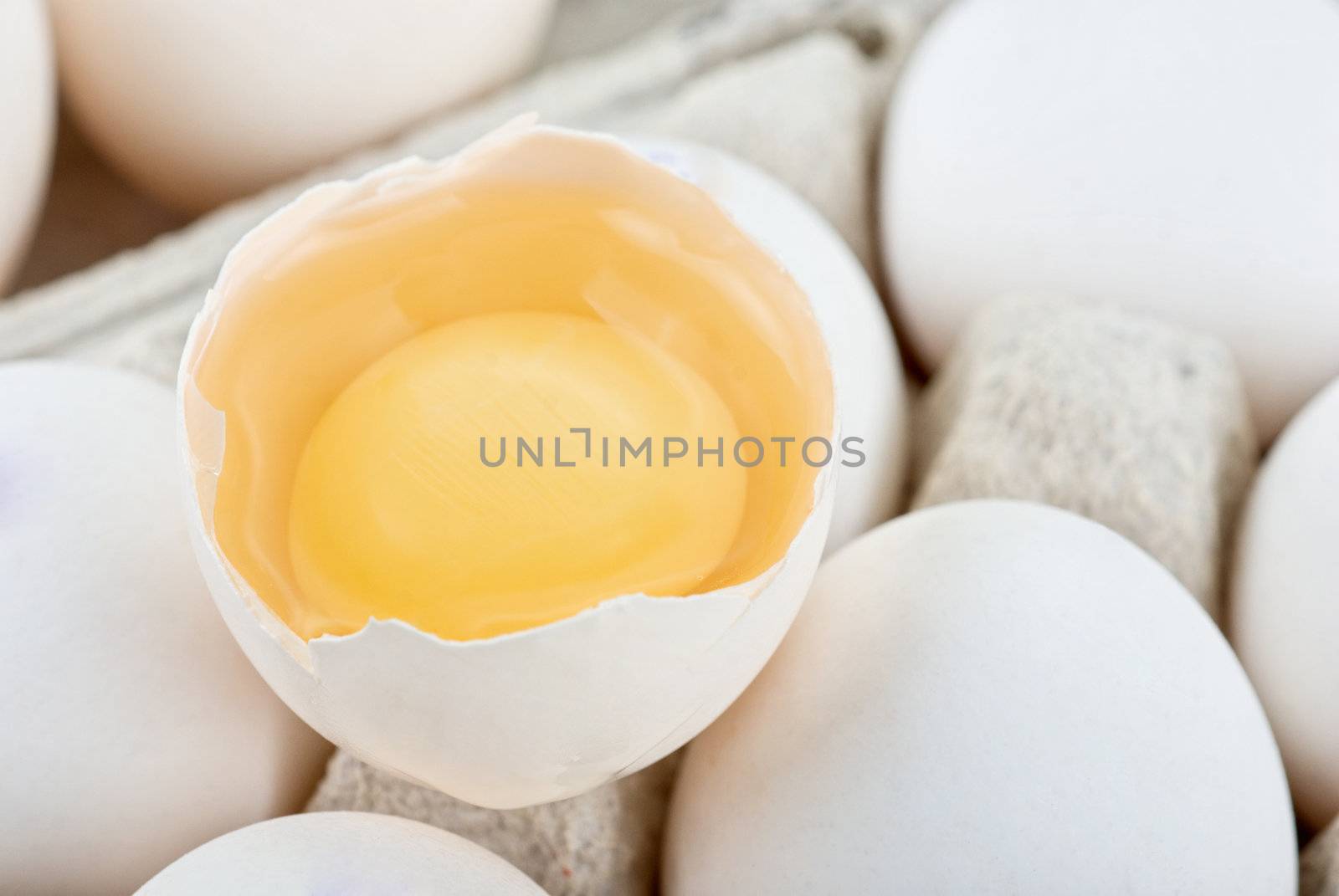 Eggs closeup with one egg is broken