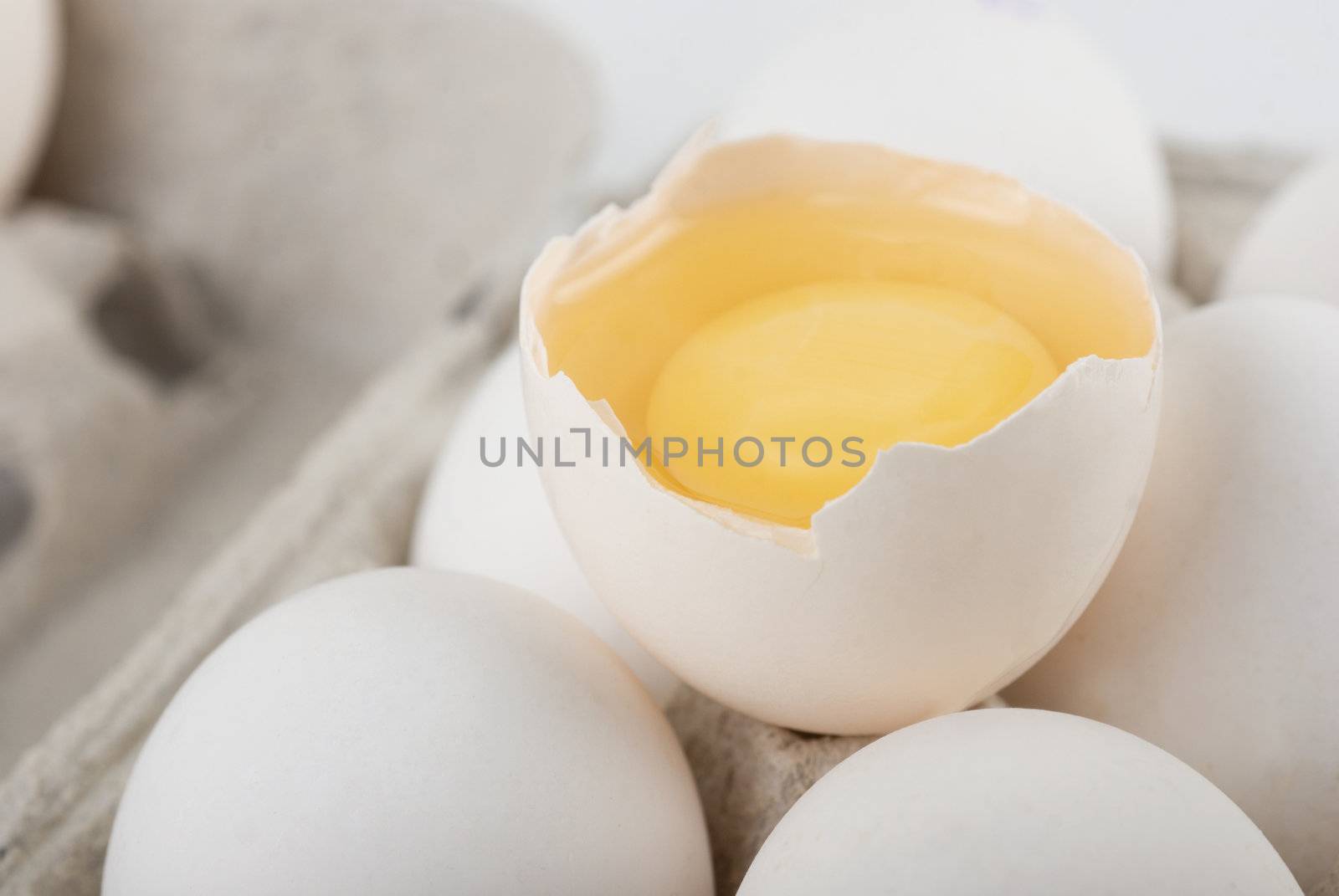 Eggs closeup with one egg is broken