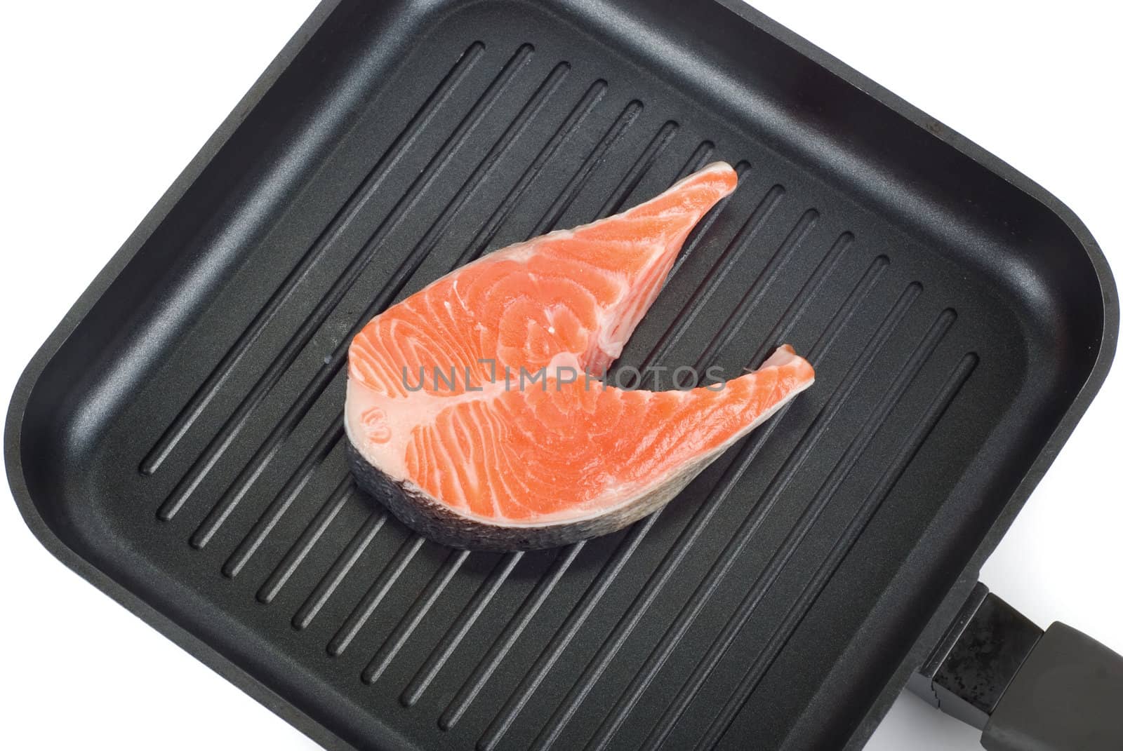 trout steak at grill pan on a white background