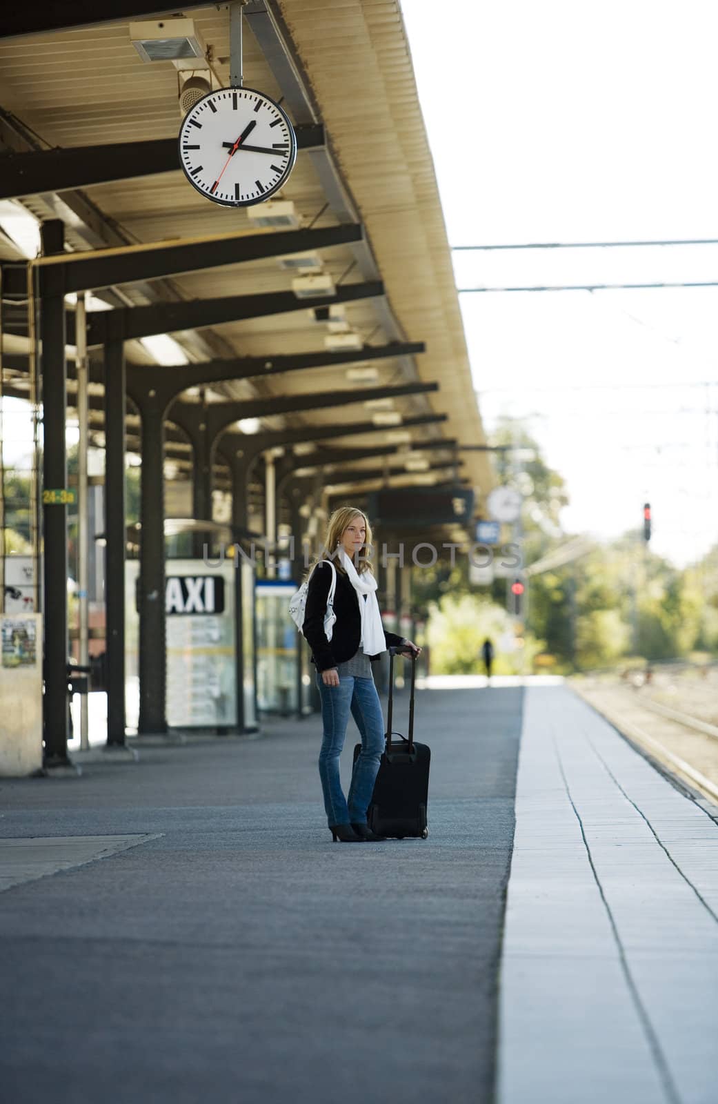 Travelling Woman at the Train Station