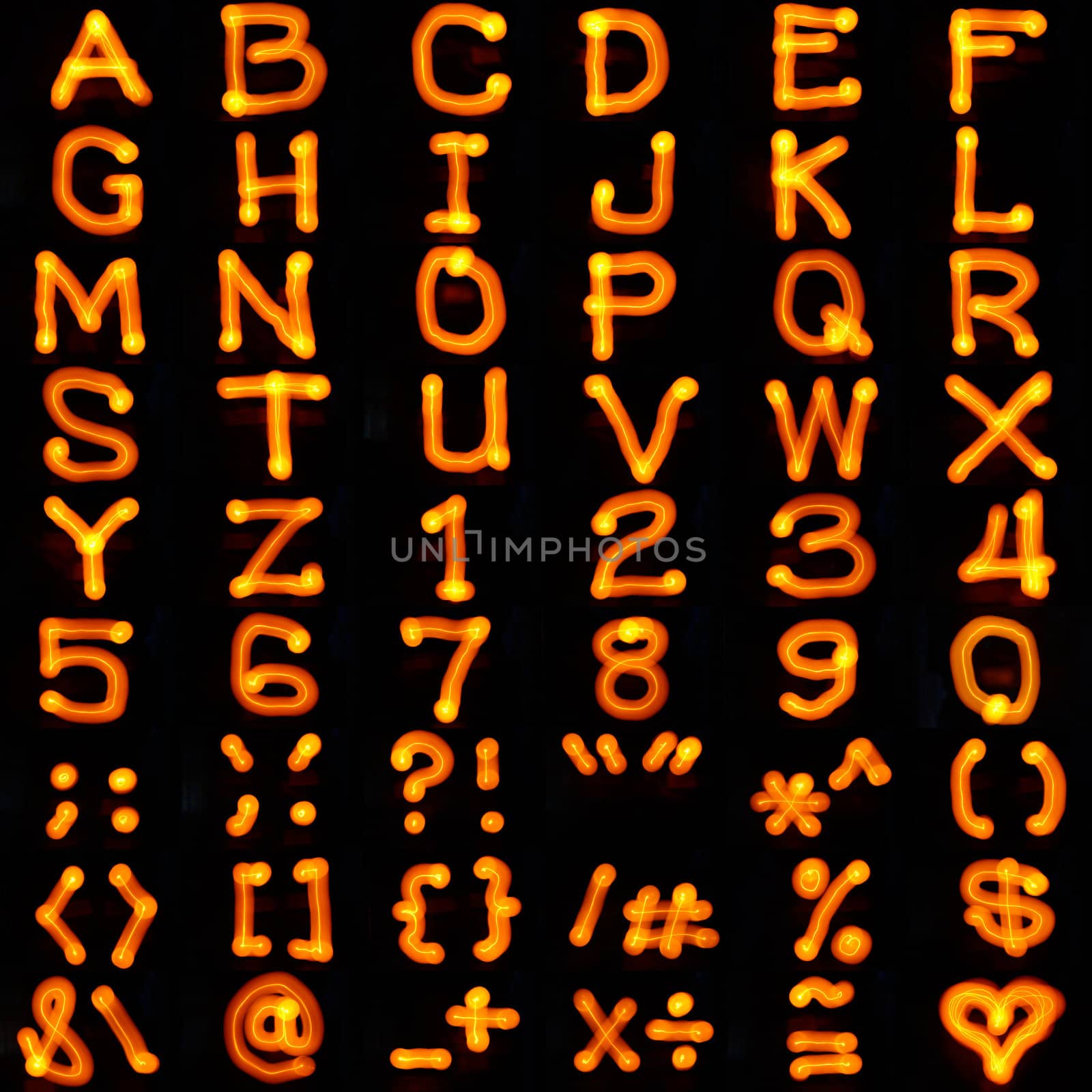 Light painting photo of english alphabet characters and symbols.