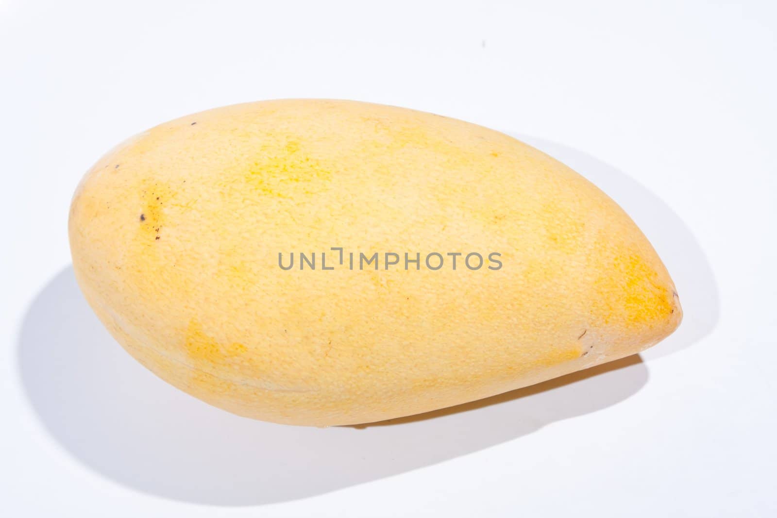 A sweet mango pigs. Savory creamy yellow color on a white background.