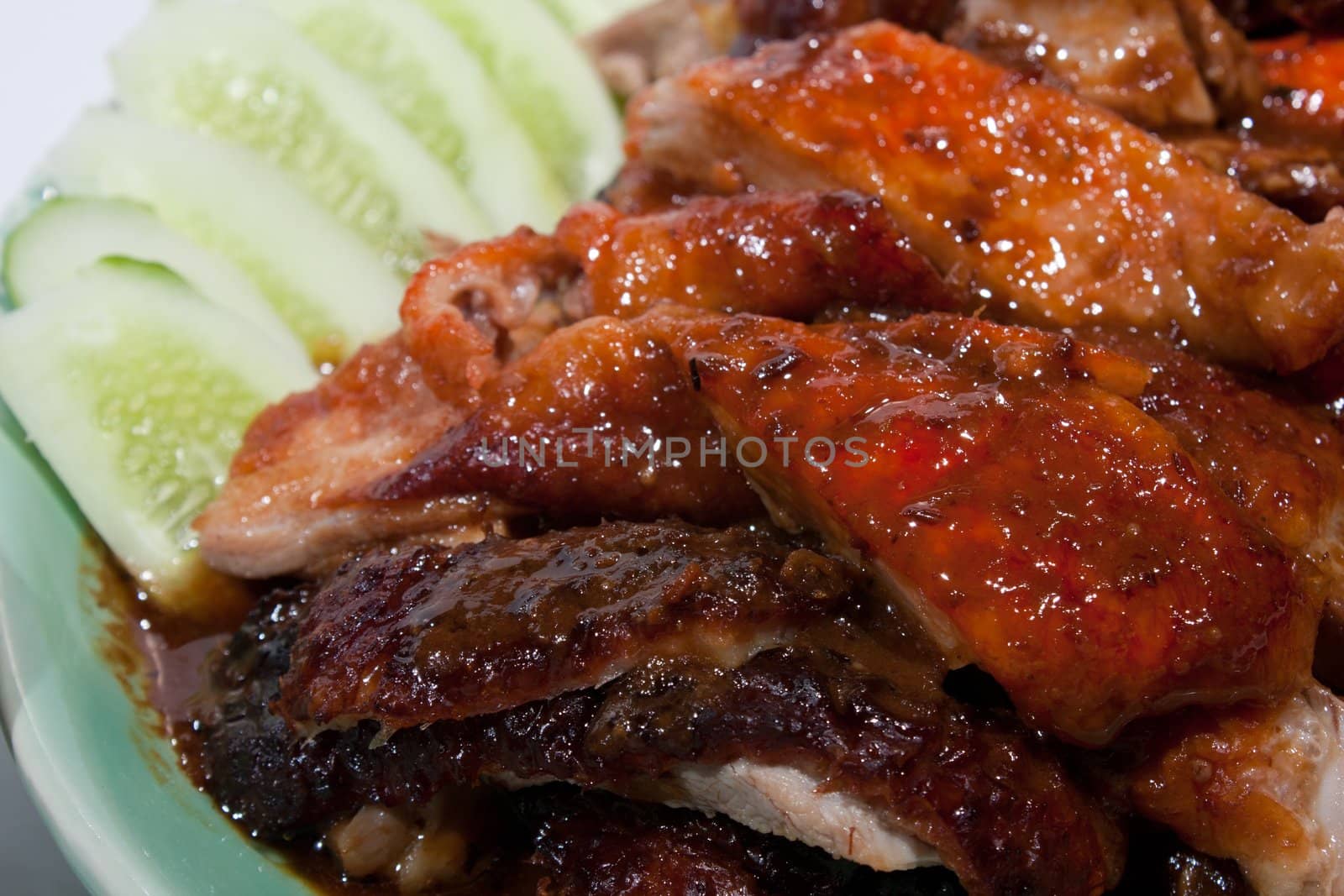 Roast Duck Thai food. Arrange on a plate to be palatable Placed on a white background.