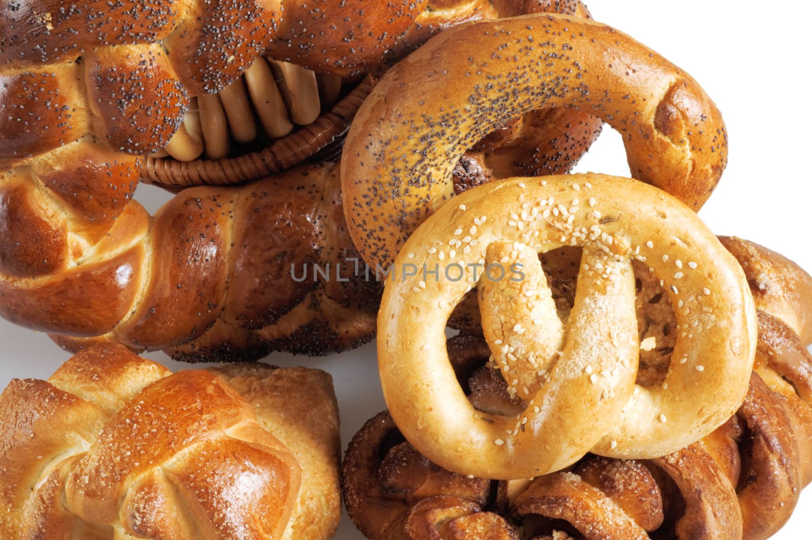 rolls and other grain products on a white background