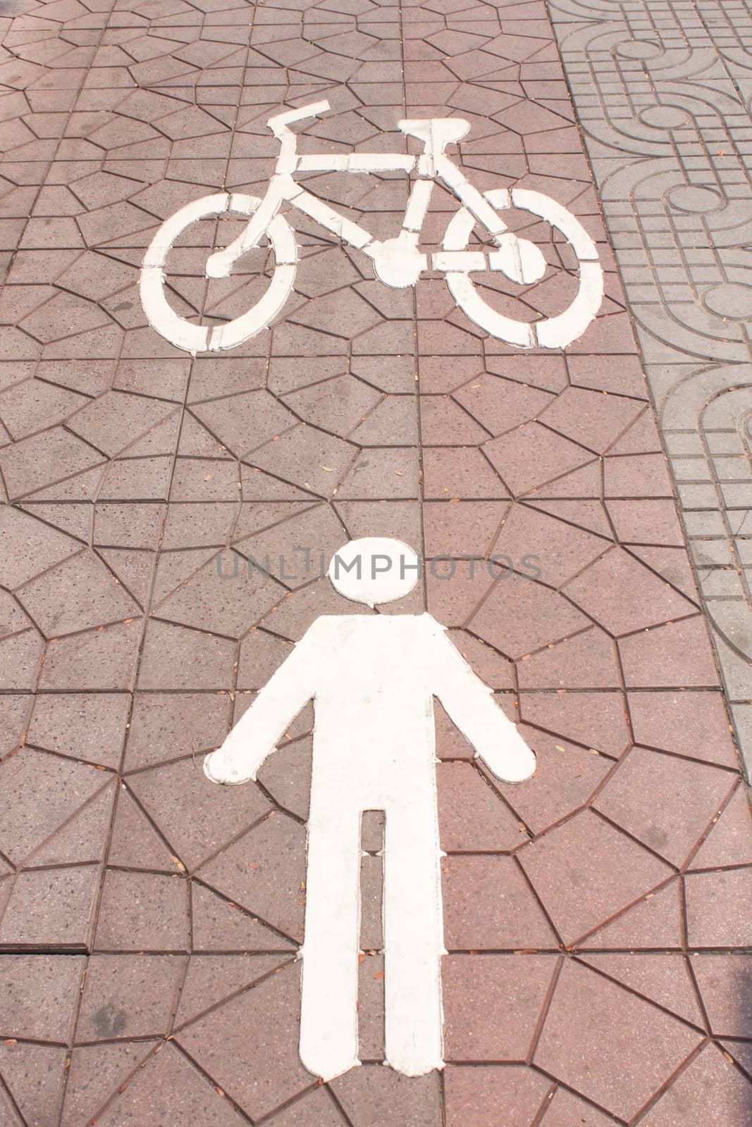 Symbol that is pedestrian for walking and cycling.
