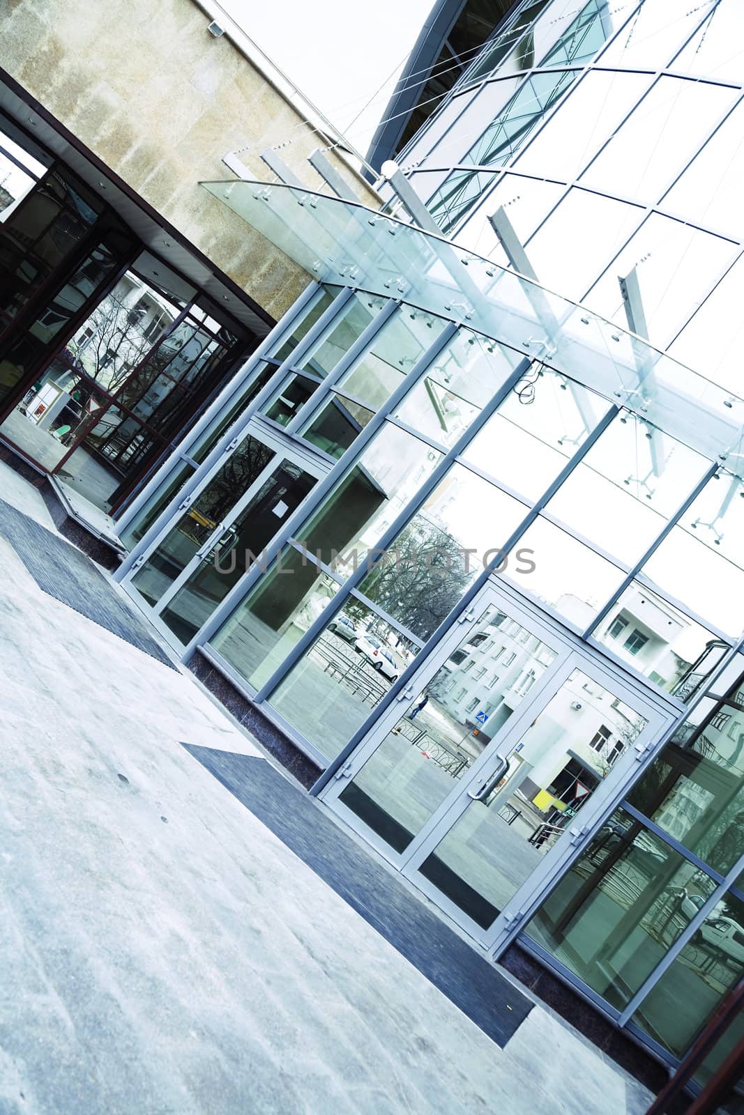 architectural metal and glass with reflections as urban background