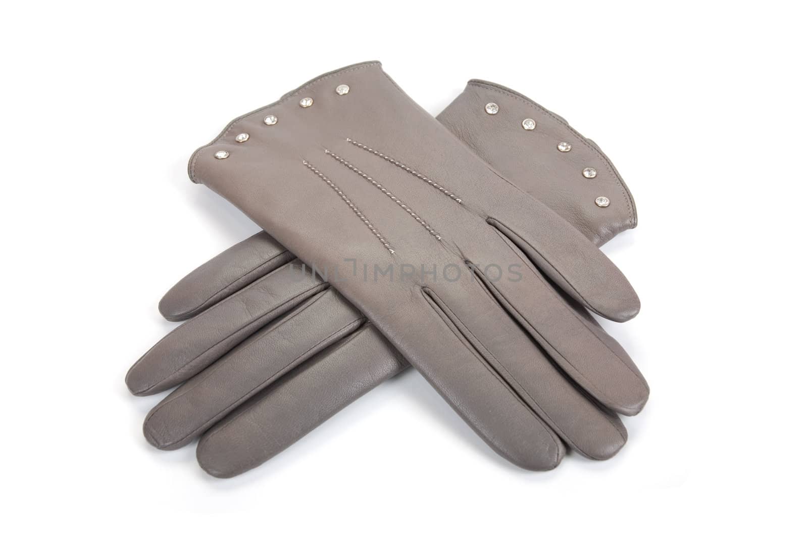 Grey modern female leather gloves isolated on a white