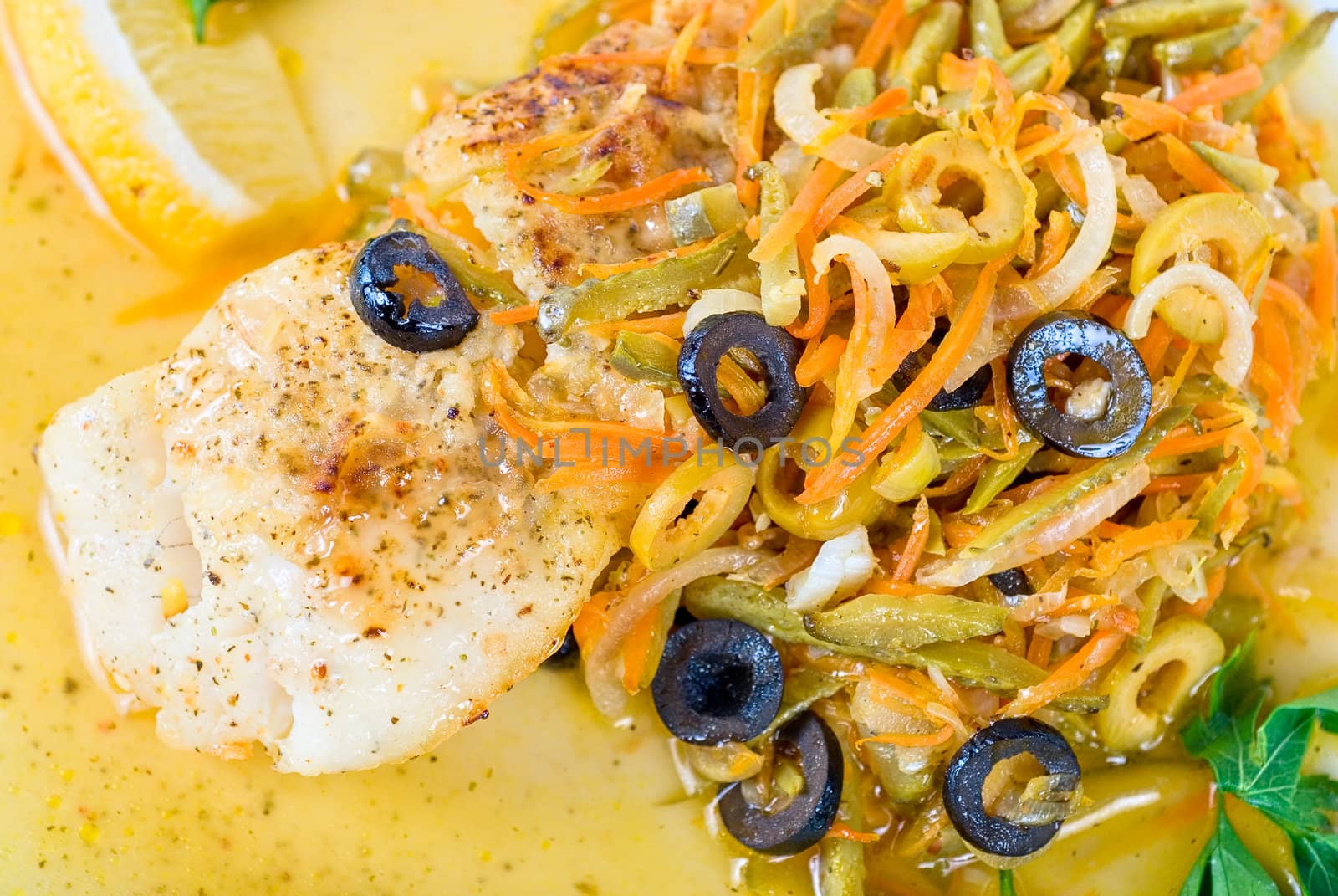 Tasty fish pike perch with mix of vegetables