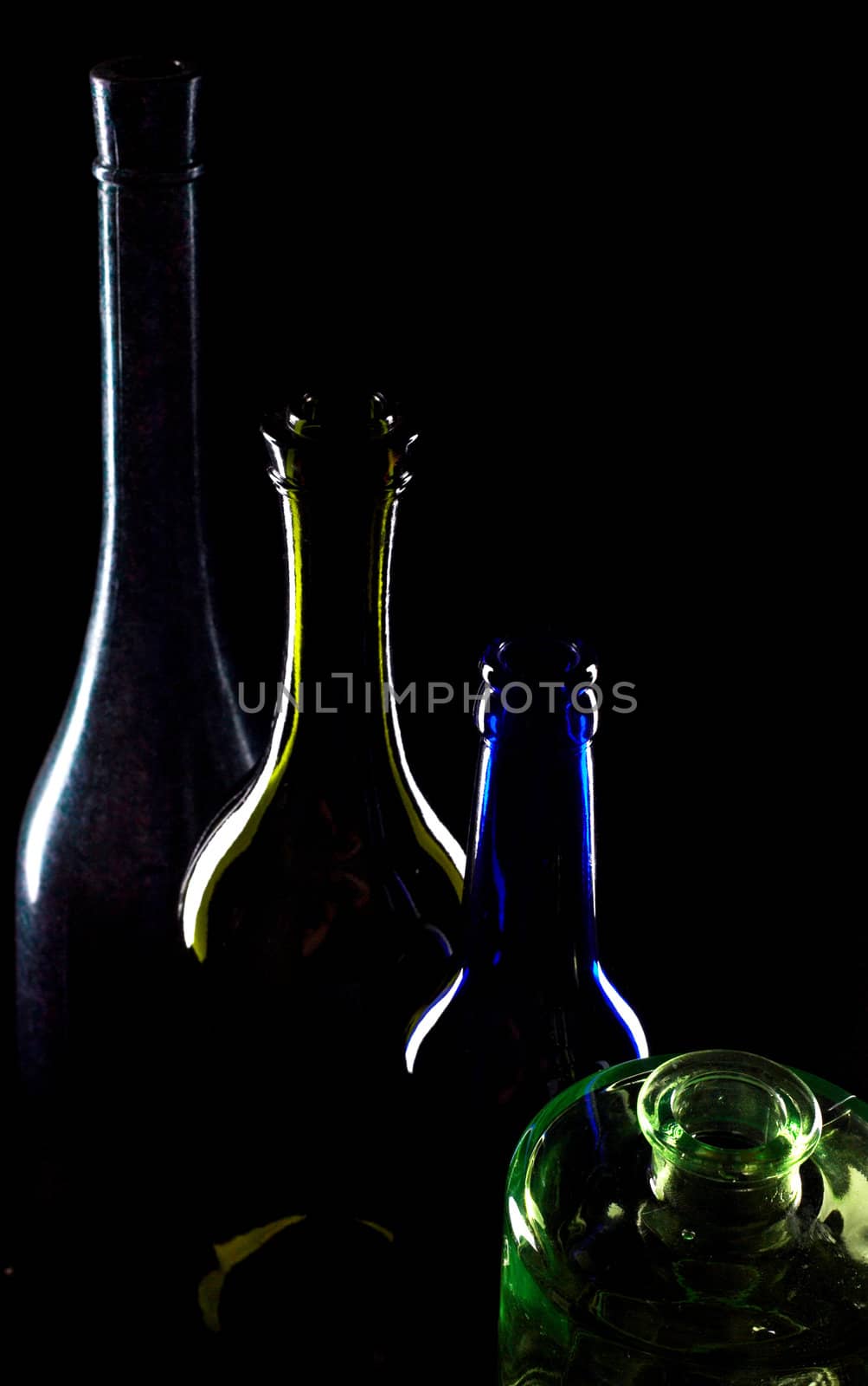 Bottles of wine on black by velkol