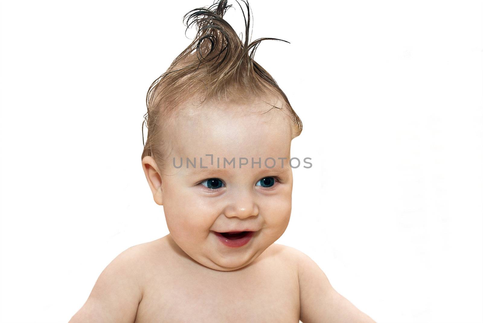Happy little boy with a hairstyle isolated on a white background.