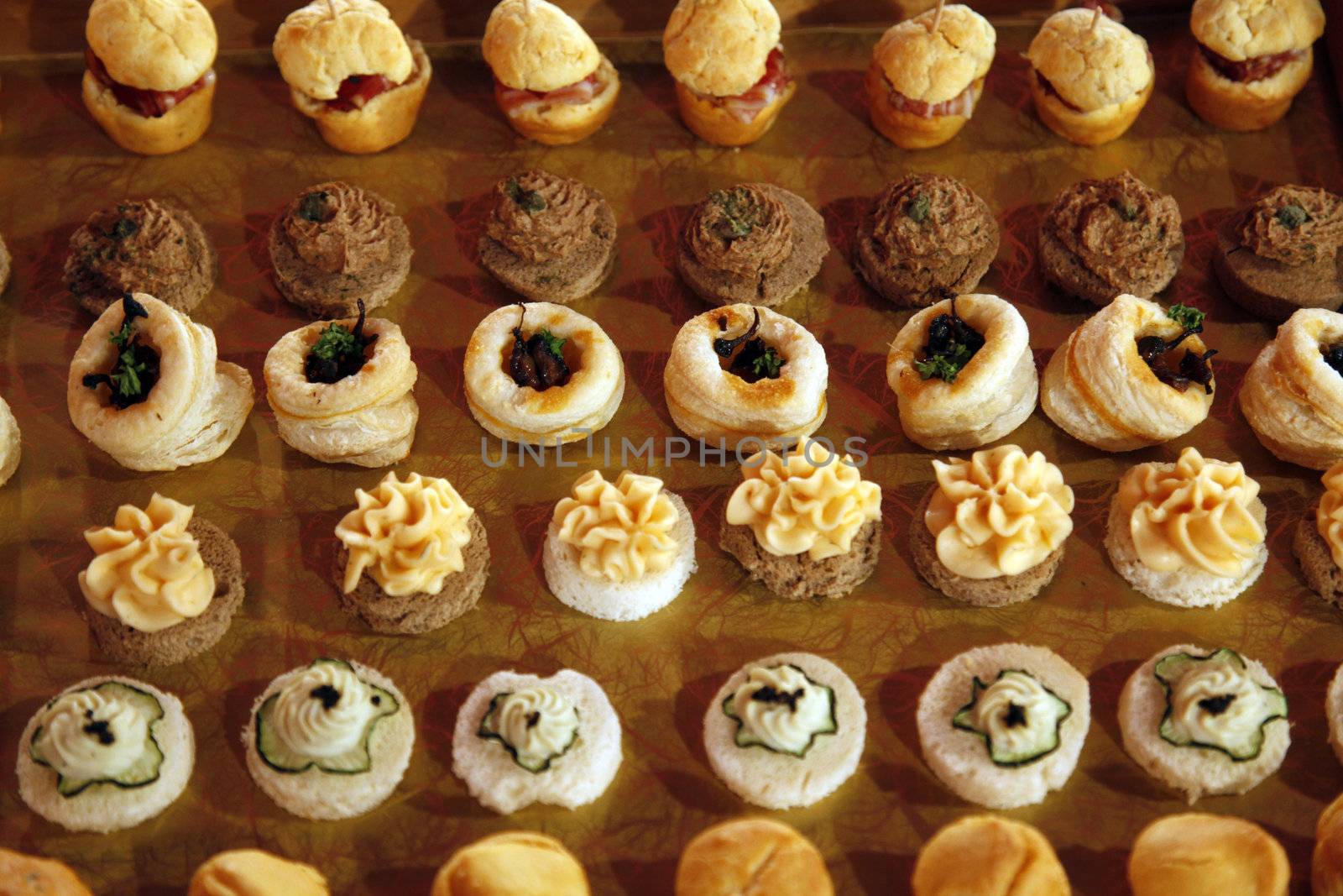 Colorful desserts and pastry served on a wedding party