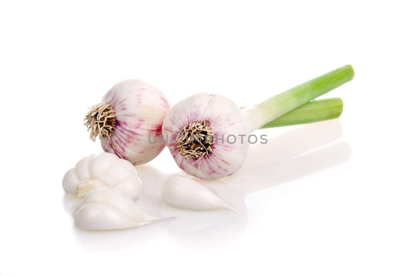 Garlic Vegetable and Cloves Isolated on White by alphacell