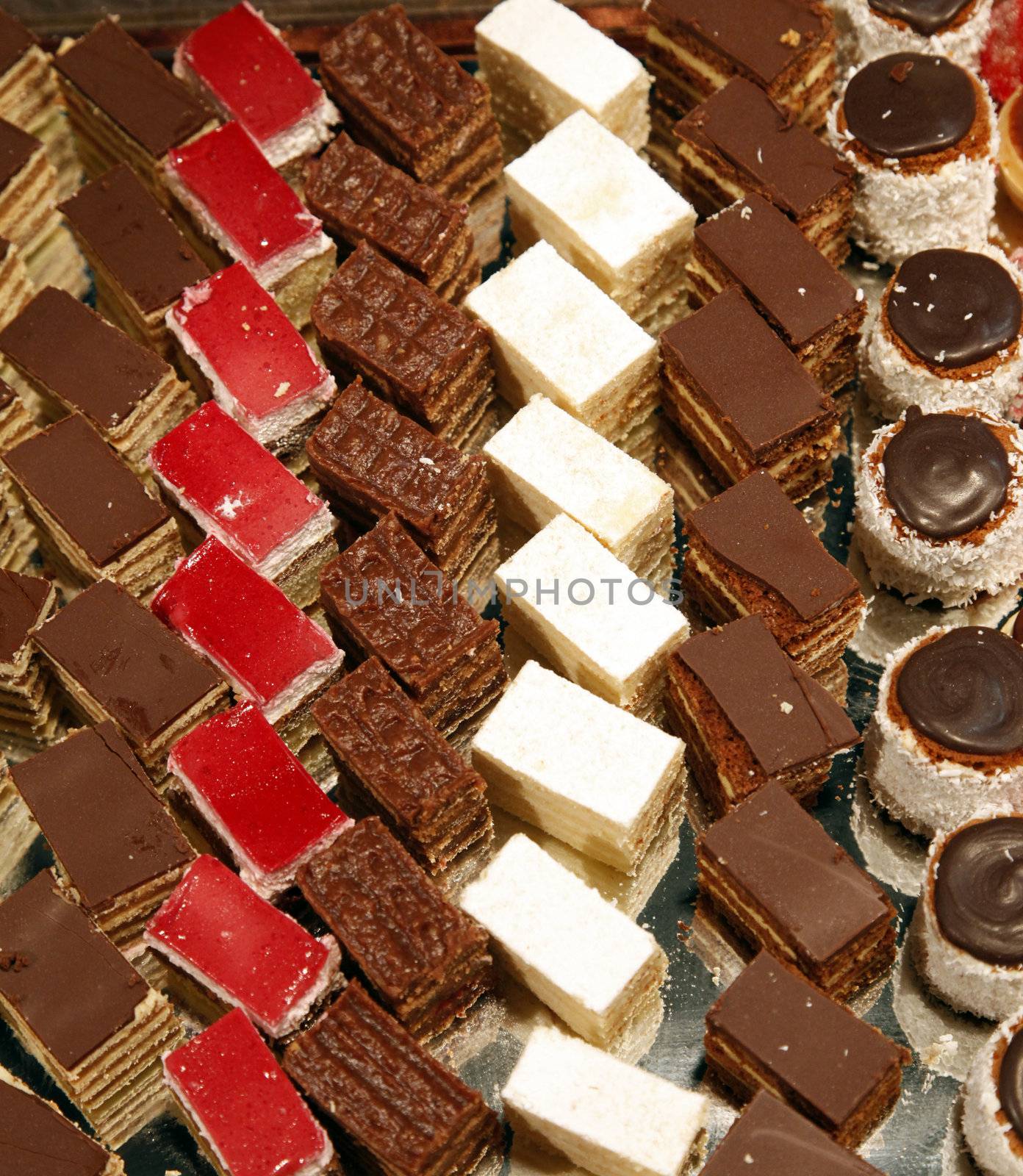 Colorful desserts and pastry served on a wedding party